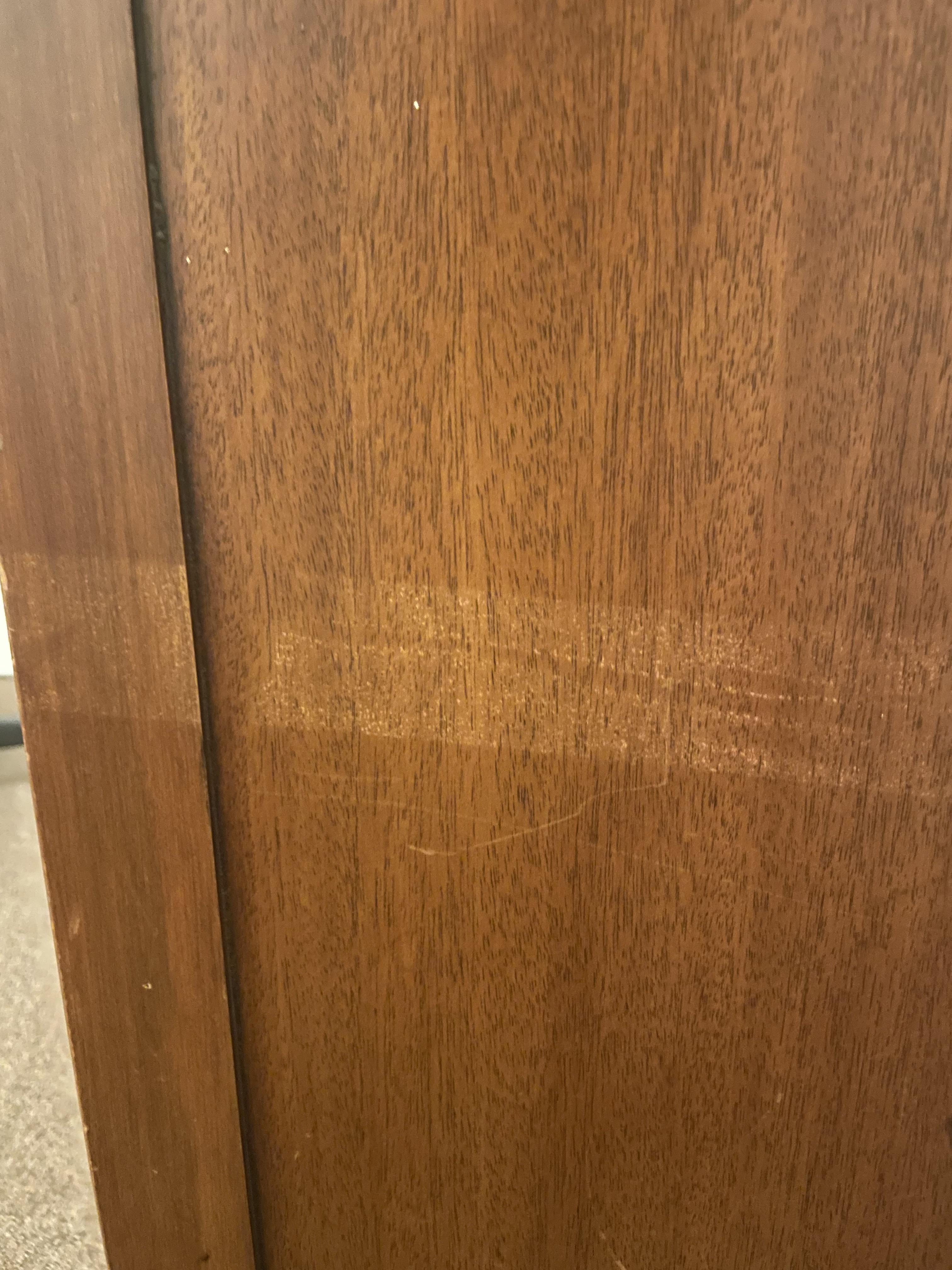 Any ideas how to fix this painter’s tape damage on an antique piece