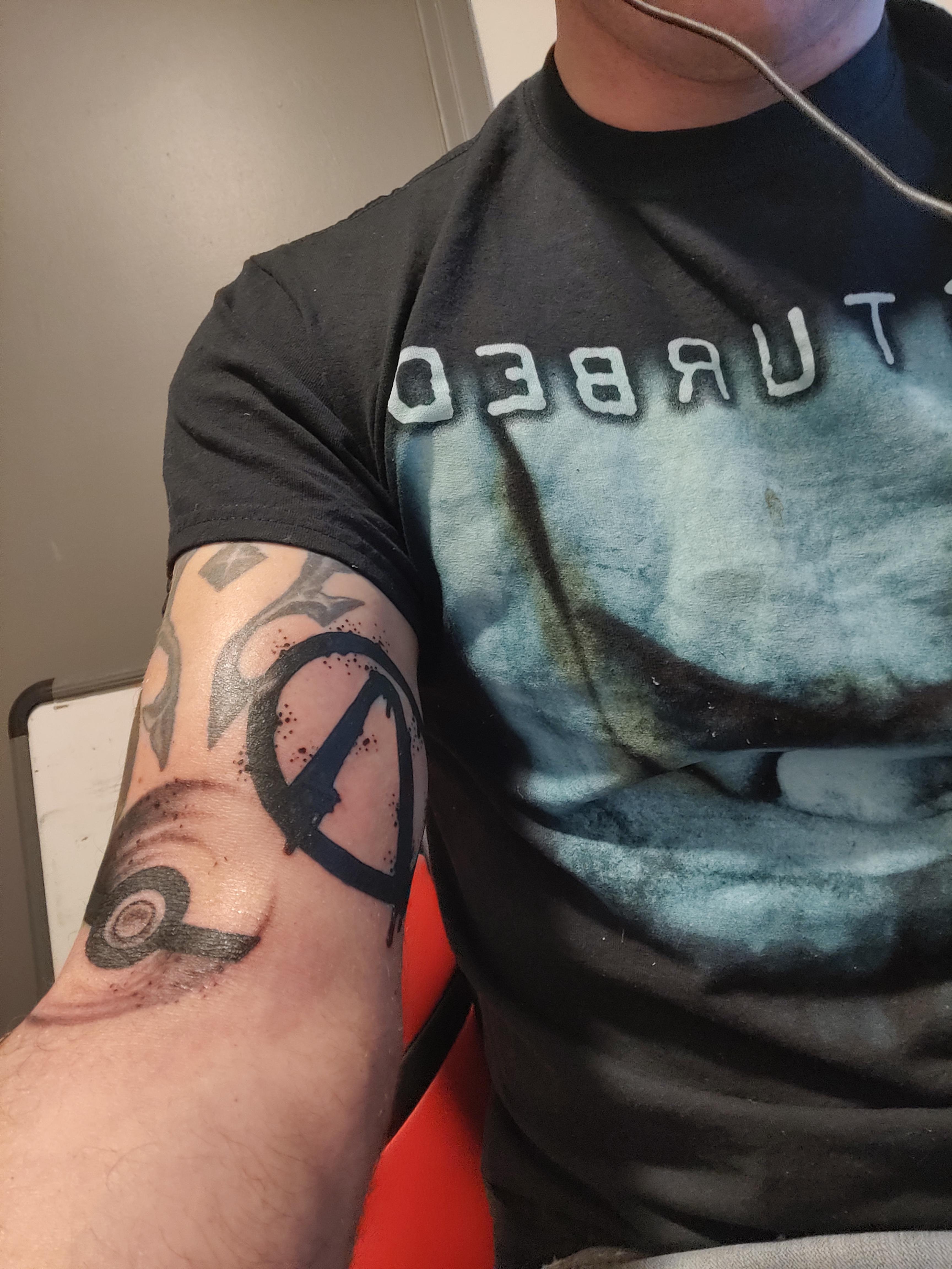 Two more logo tattoos added to the video game arm r/gaming