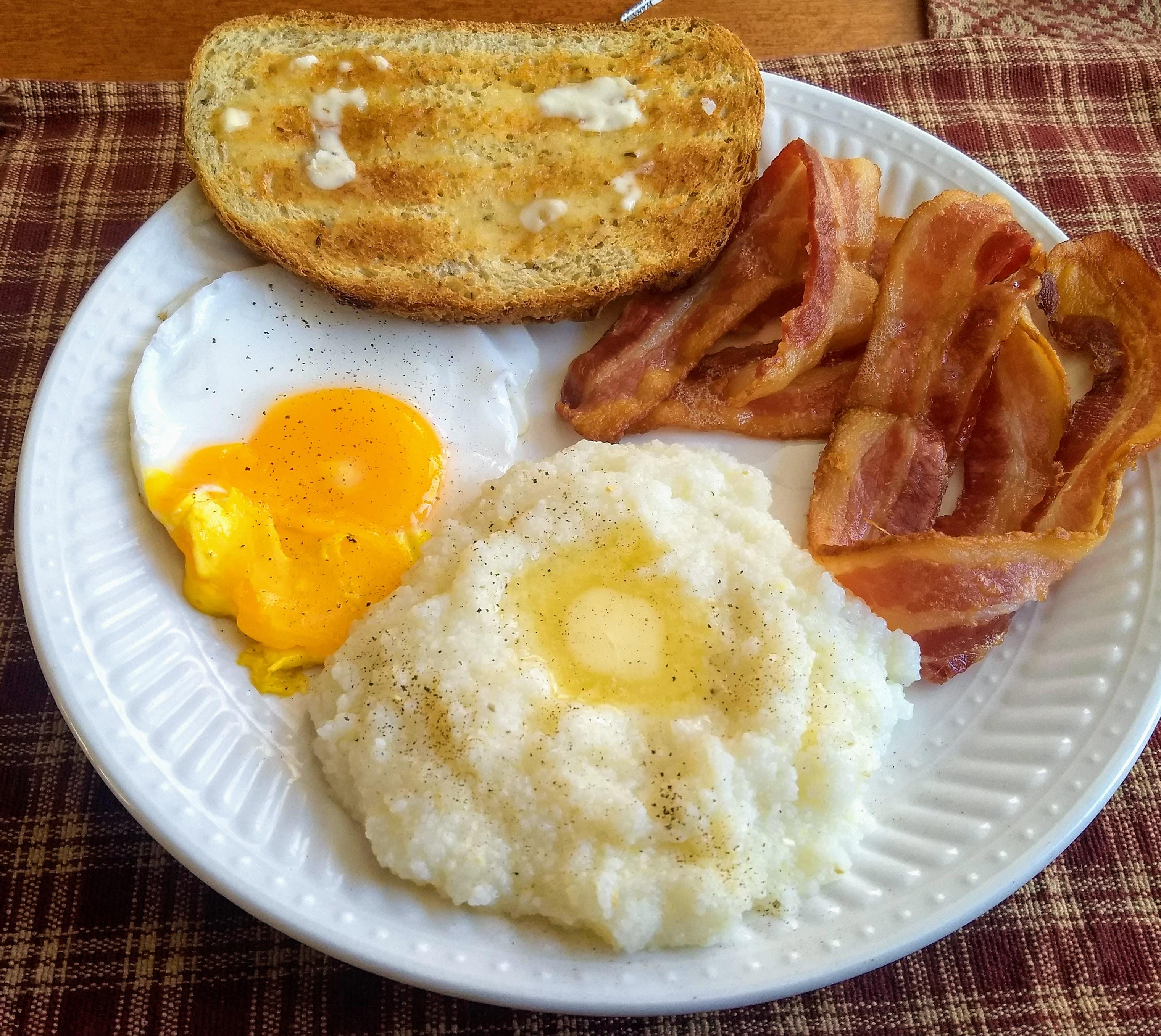 Rye, bacon, Grits, Duck egg. [Homemade] r/food