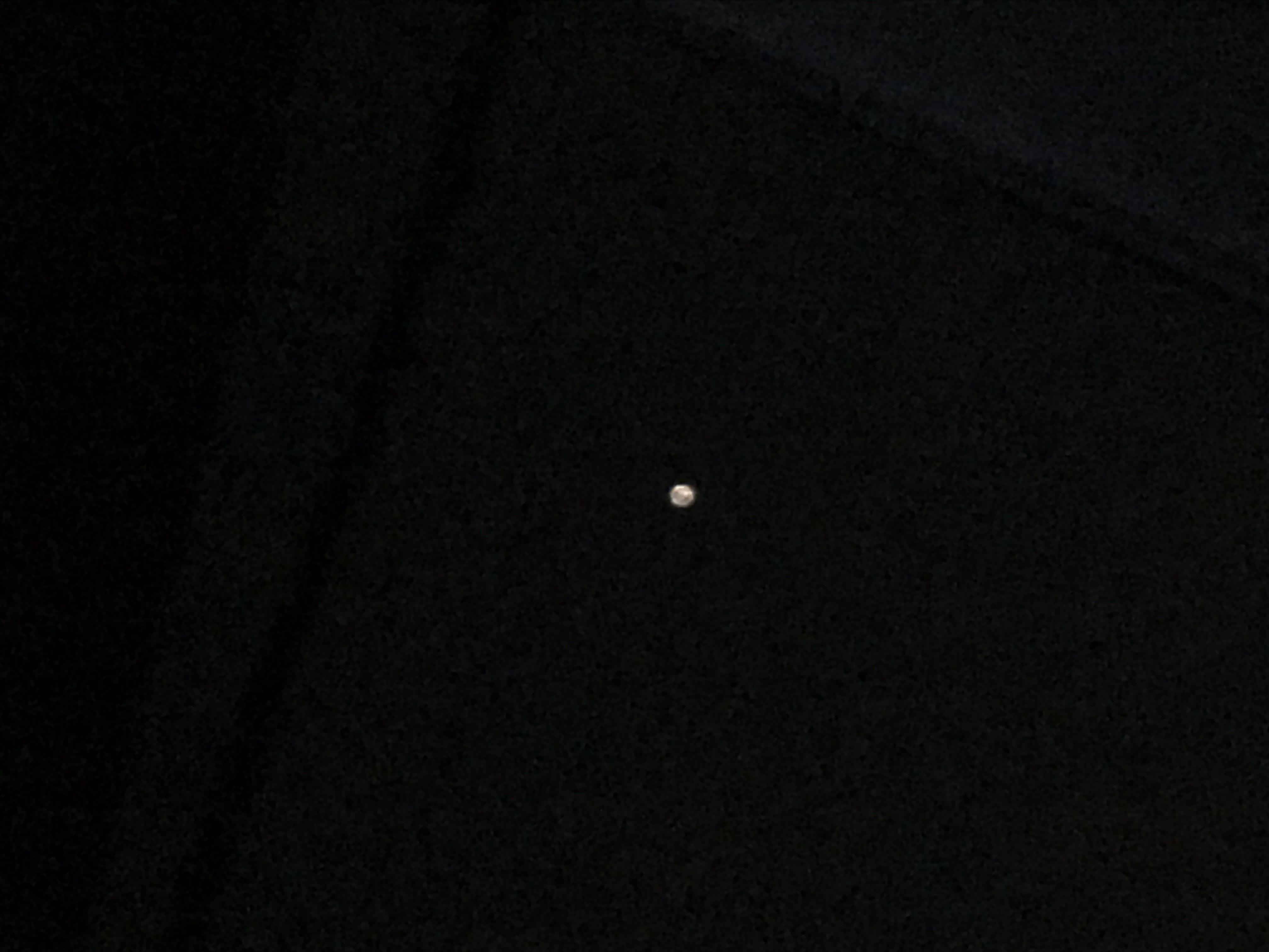 Image of small white dot that just appeared in the sky. It’s not the