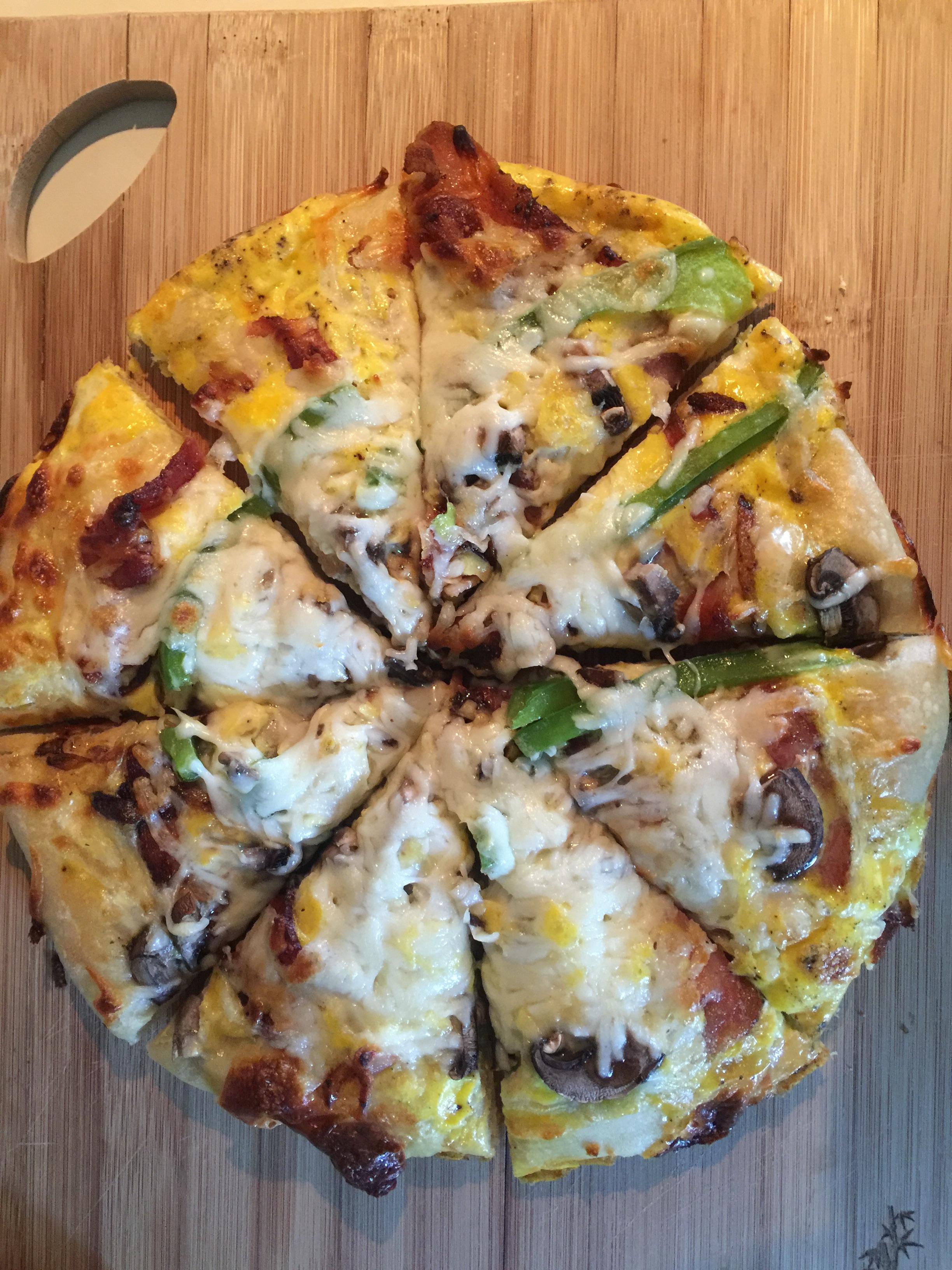 [homemade] breakfast pizza with bacon, onion, green pepper, mushroom