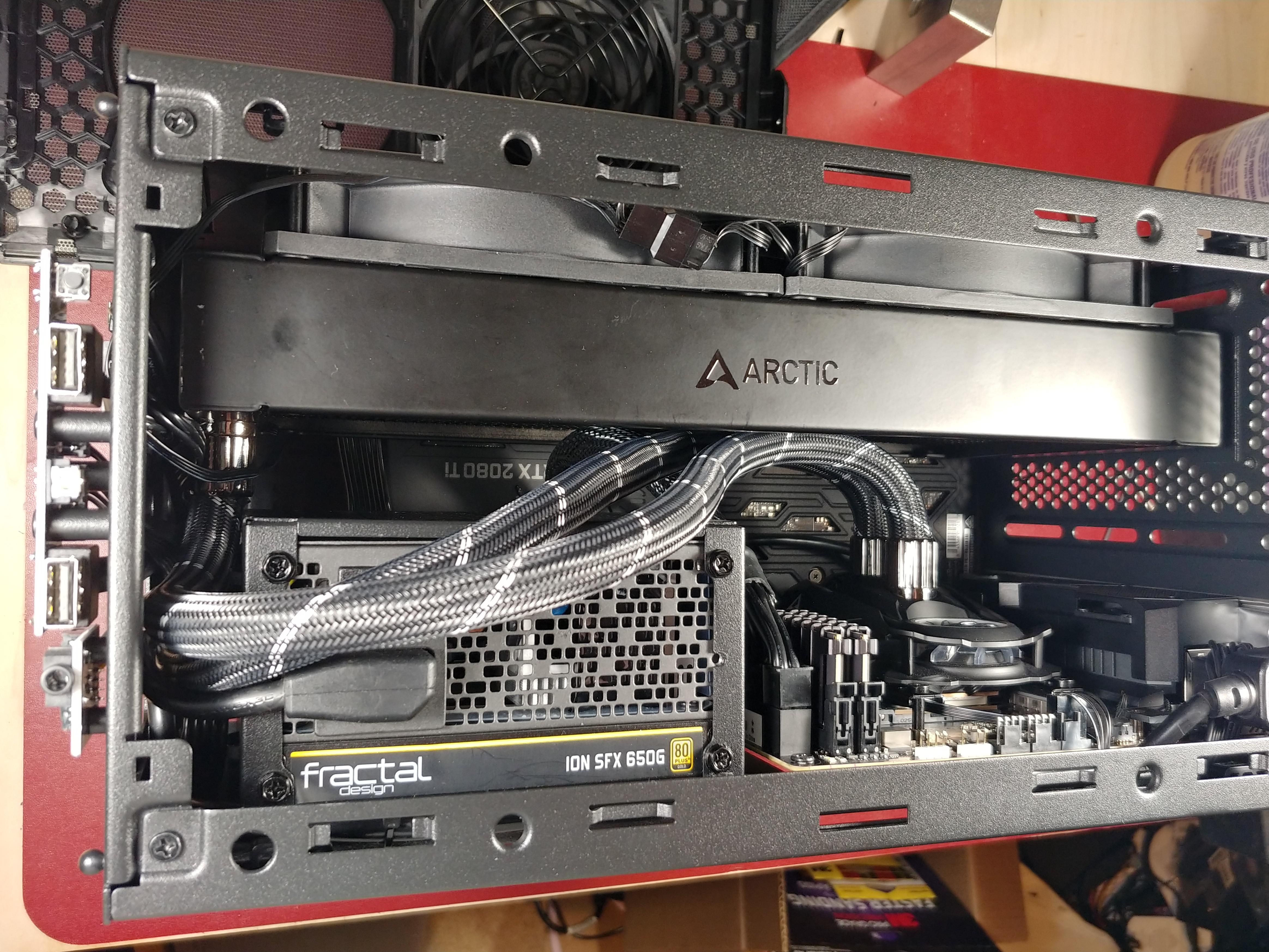 The Arctic Freezer II 280 fits in the CM NR200 like it was bloody well