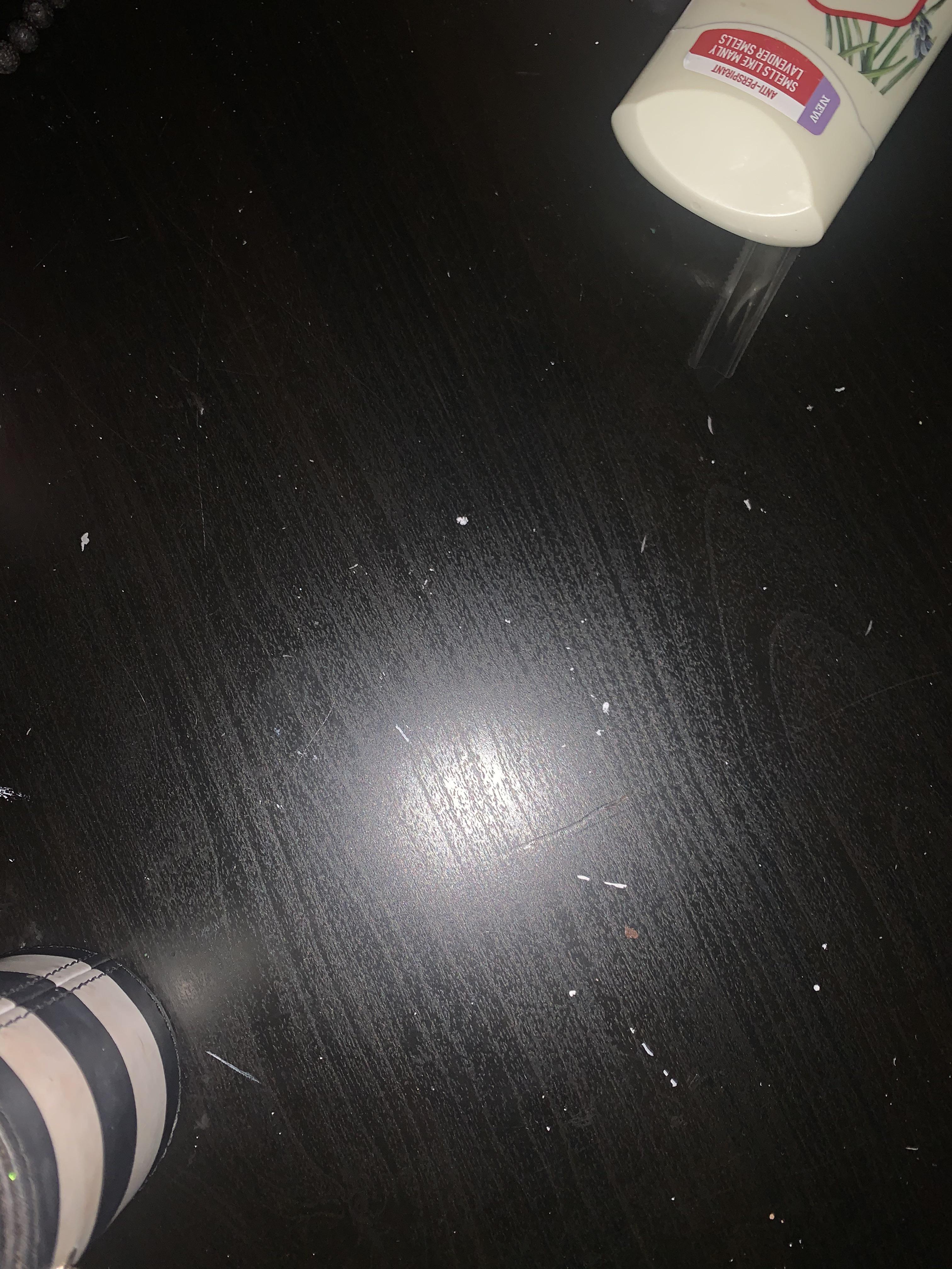 Any advice on what to use to clean this acrylic paint off this wooden desk. I’ve tried scrubbing