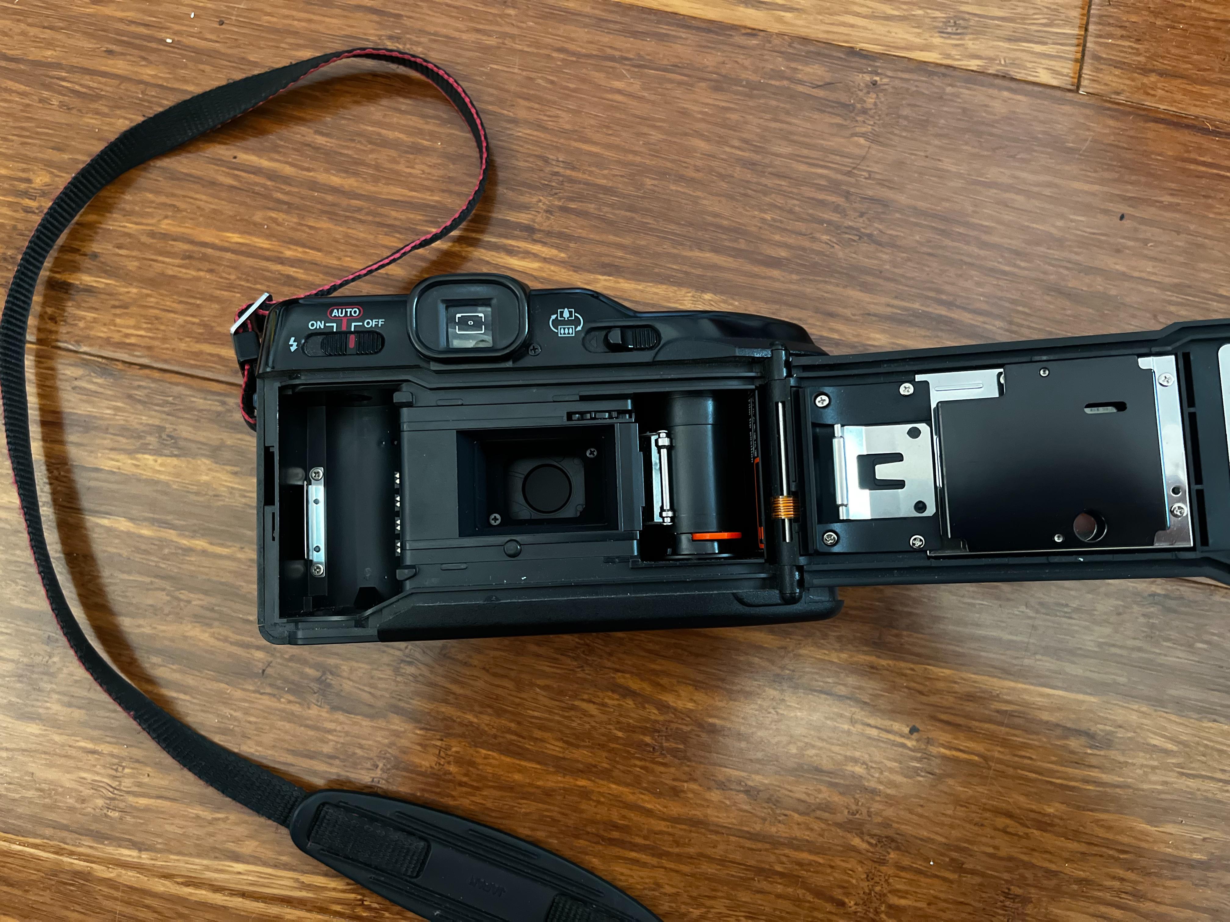 Canon Autoboy TELE won't stop rewinding (Whenever connected to battery