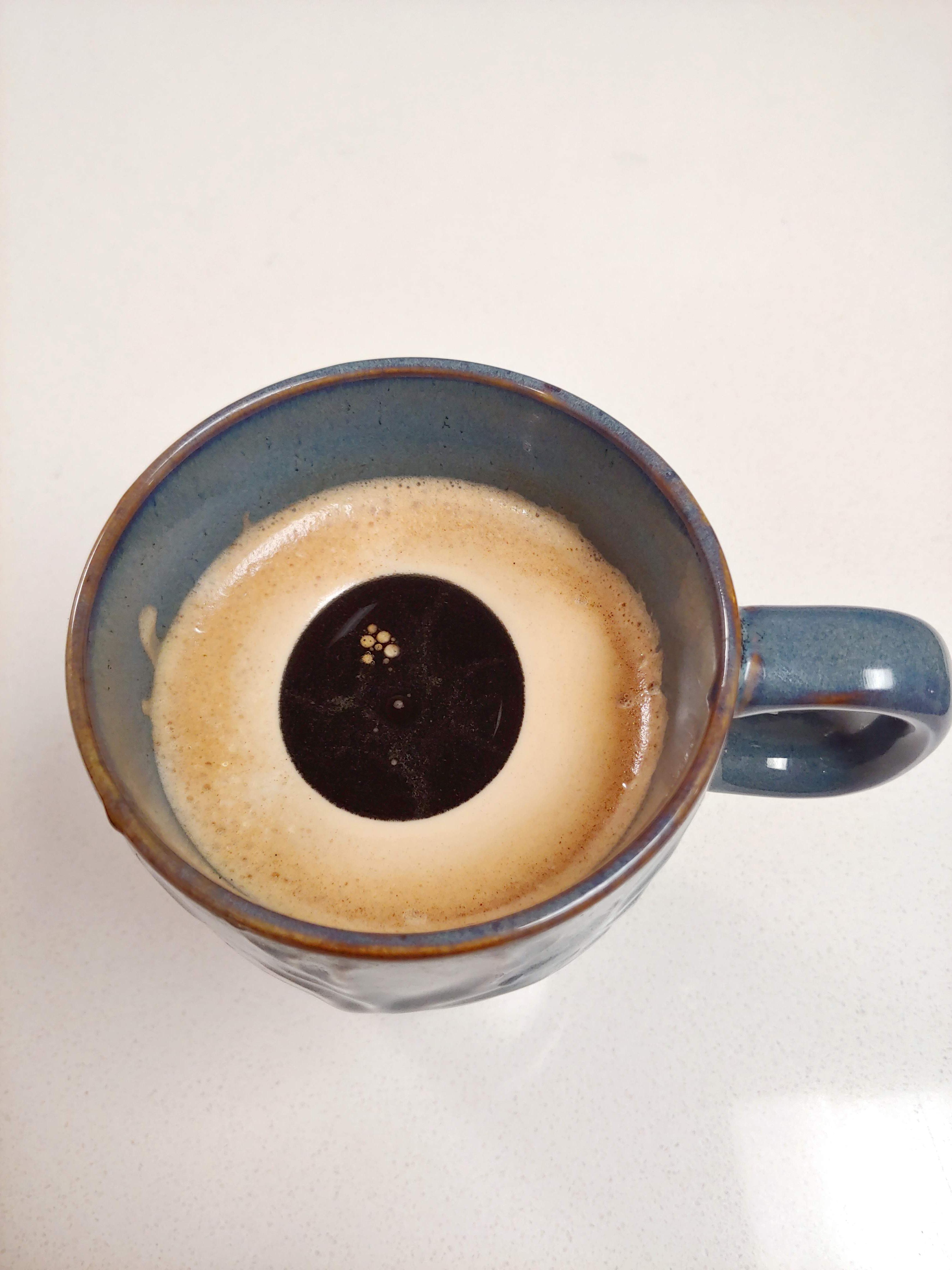 This tablespoon of MCT oil that created an eye on my coffee cup r