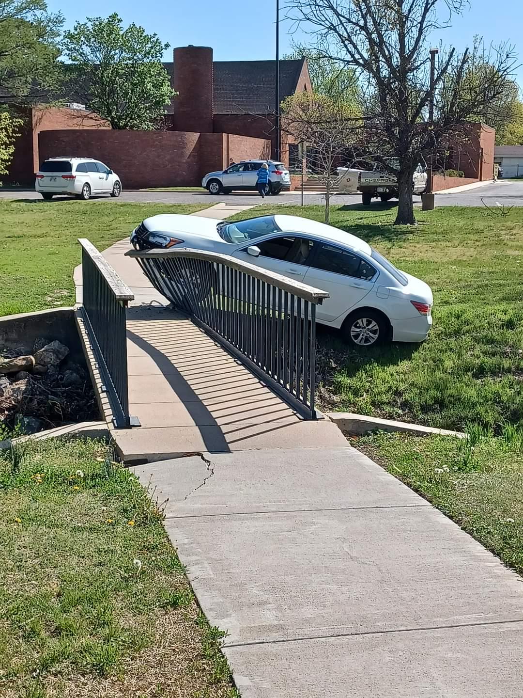 Someone hit the pedestrian bridge between Rockwell Library and Edgemoor