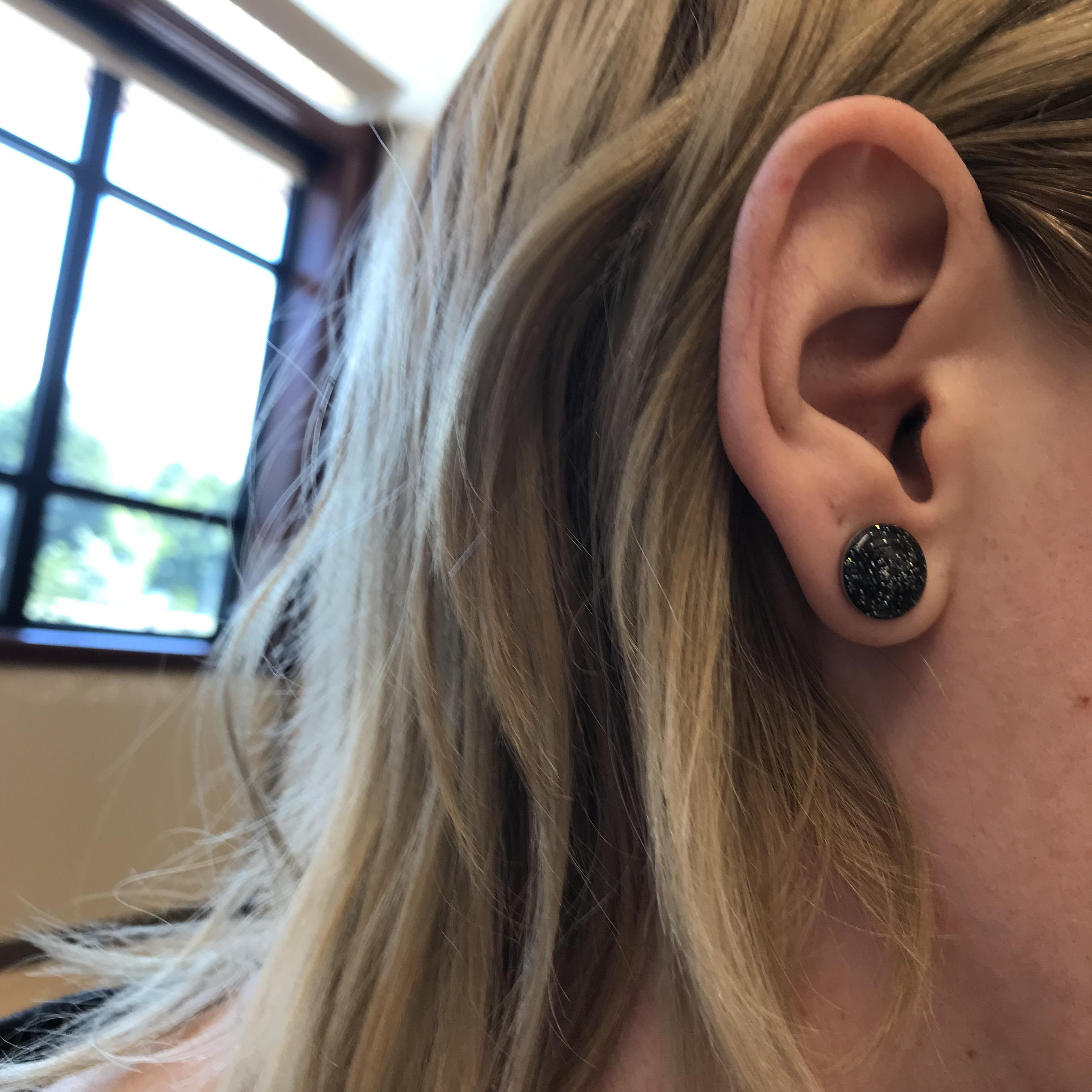 Sizing UP! 10mm to 12mm. Glass plugs (0G) were heavy enough to assist
