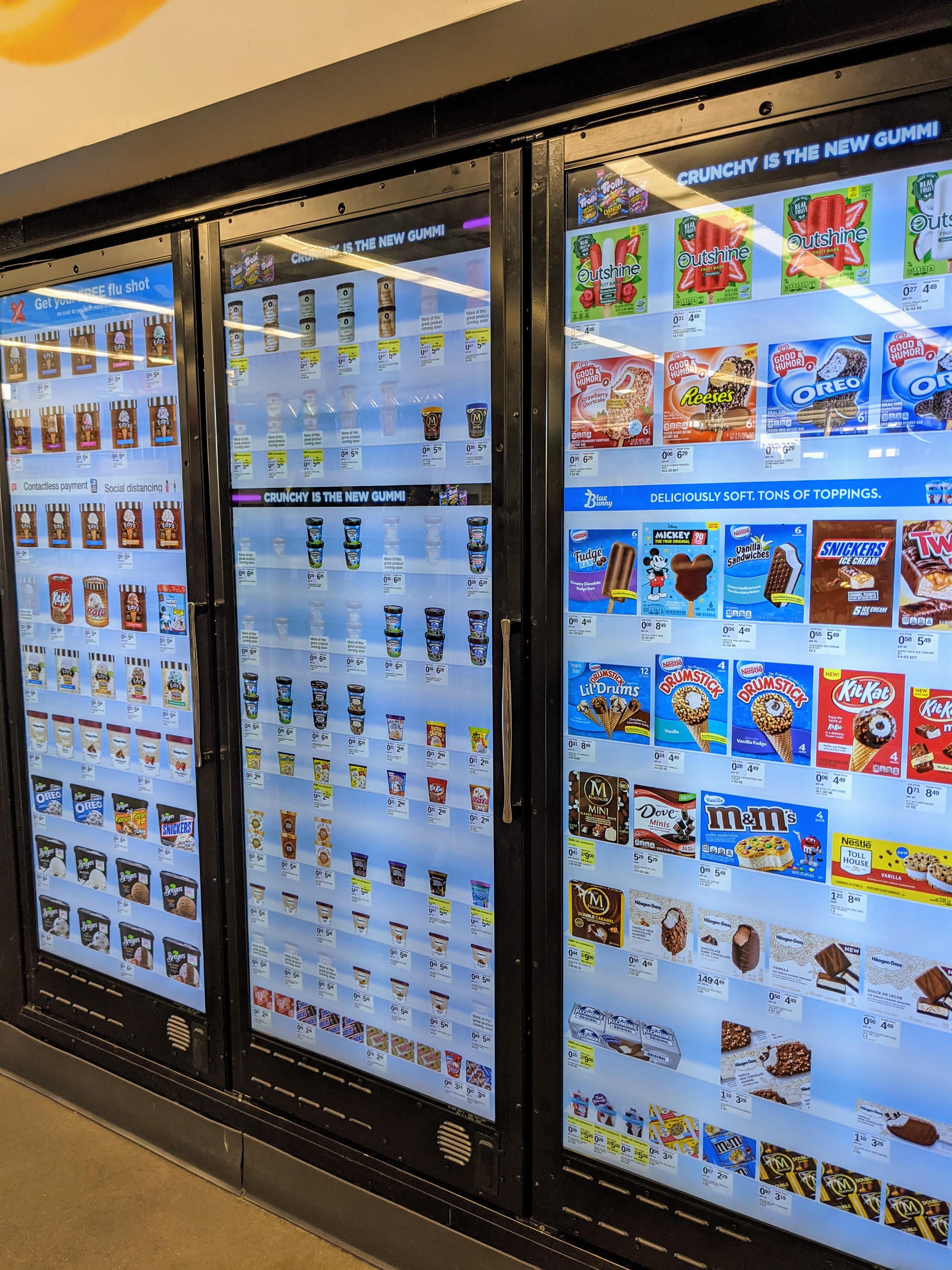 This Walgreens in Chicago has LED displays over the coolers. r