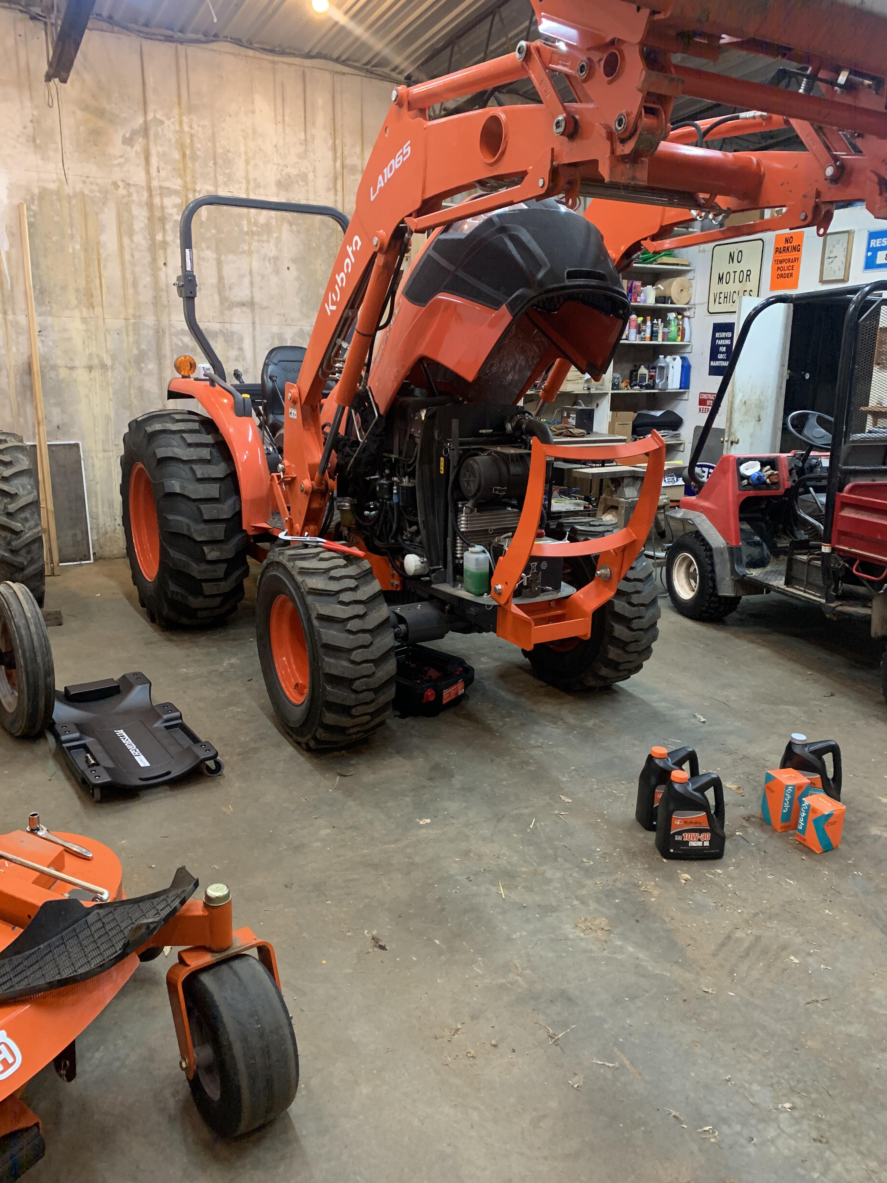 First oil change on the Kubota MX5400 r/tractors