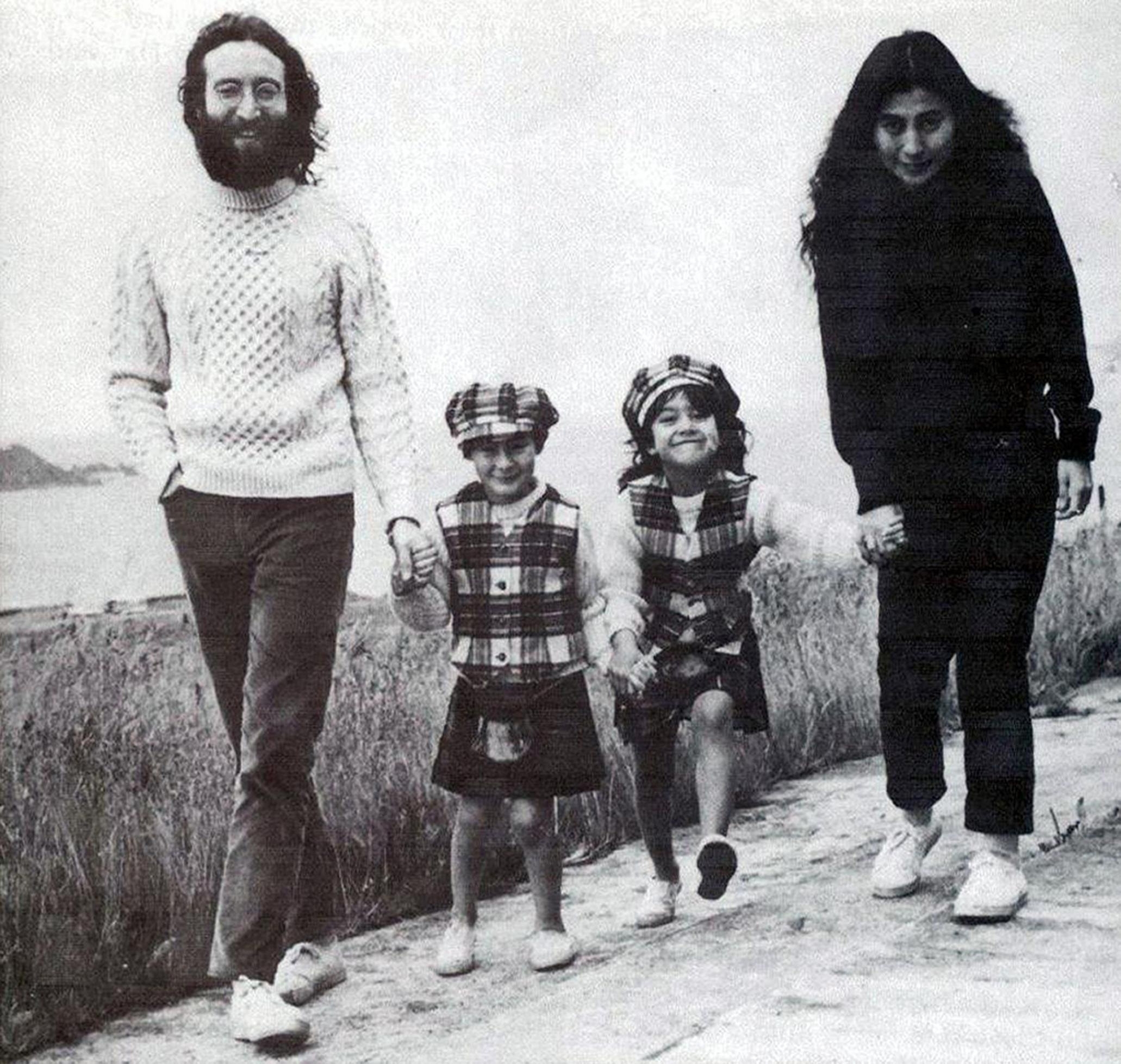 John Lennon, his son Julian, wife Yoko Ono and her daughter, Kyoko, in