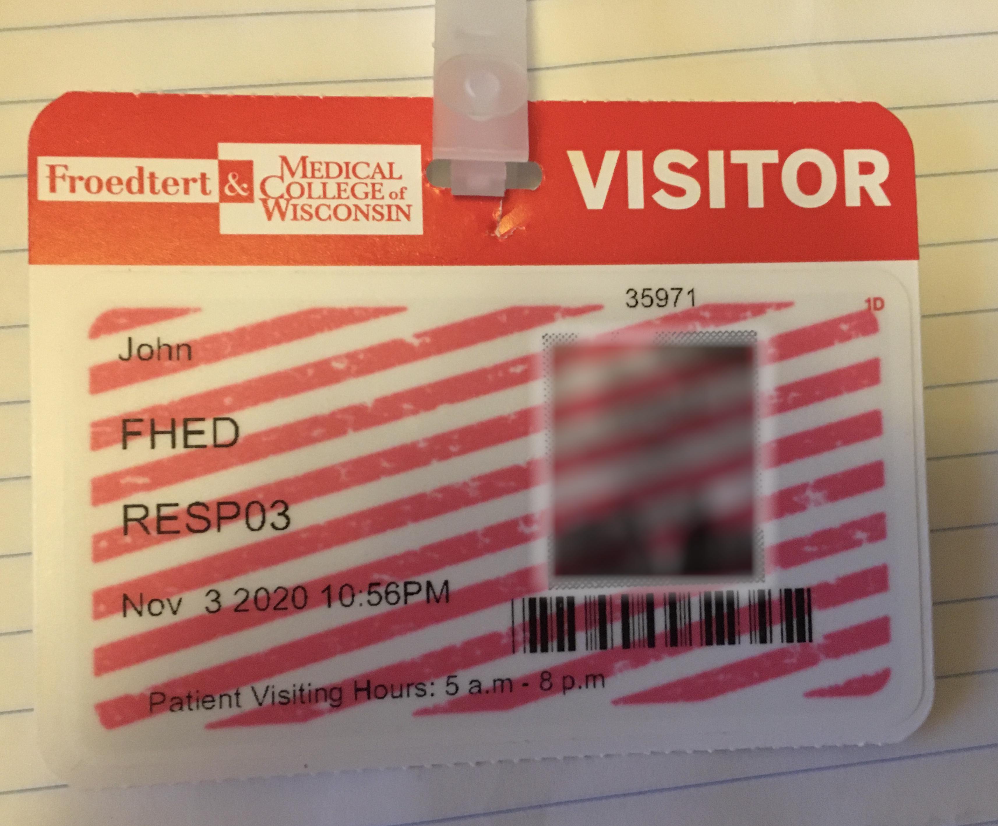 This hospital visitor pass, that automatically develops red lines after