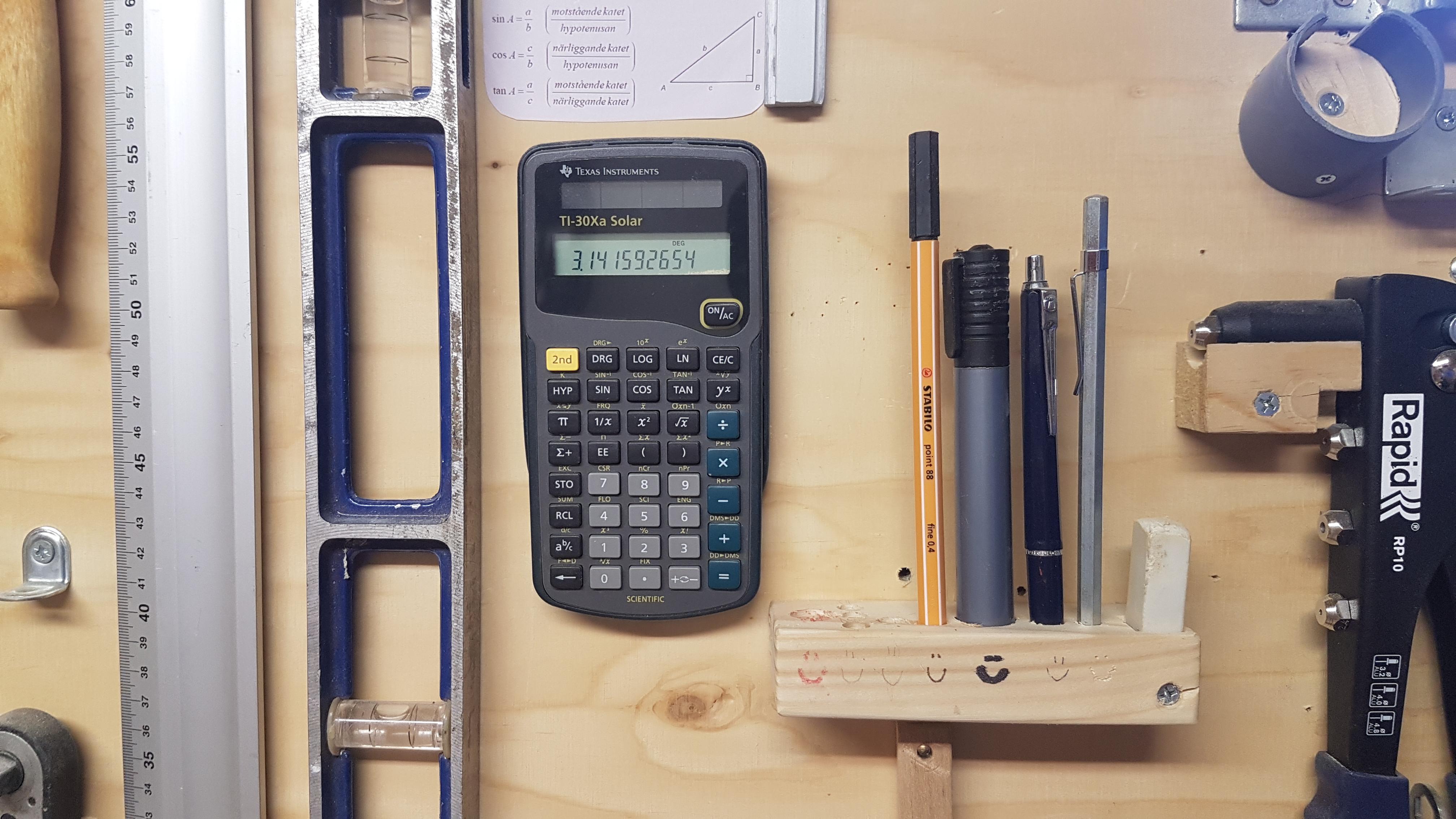 calculator on a wall is probably my favorite thing about my shop r