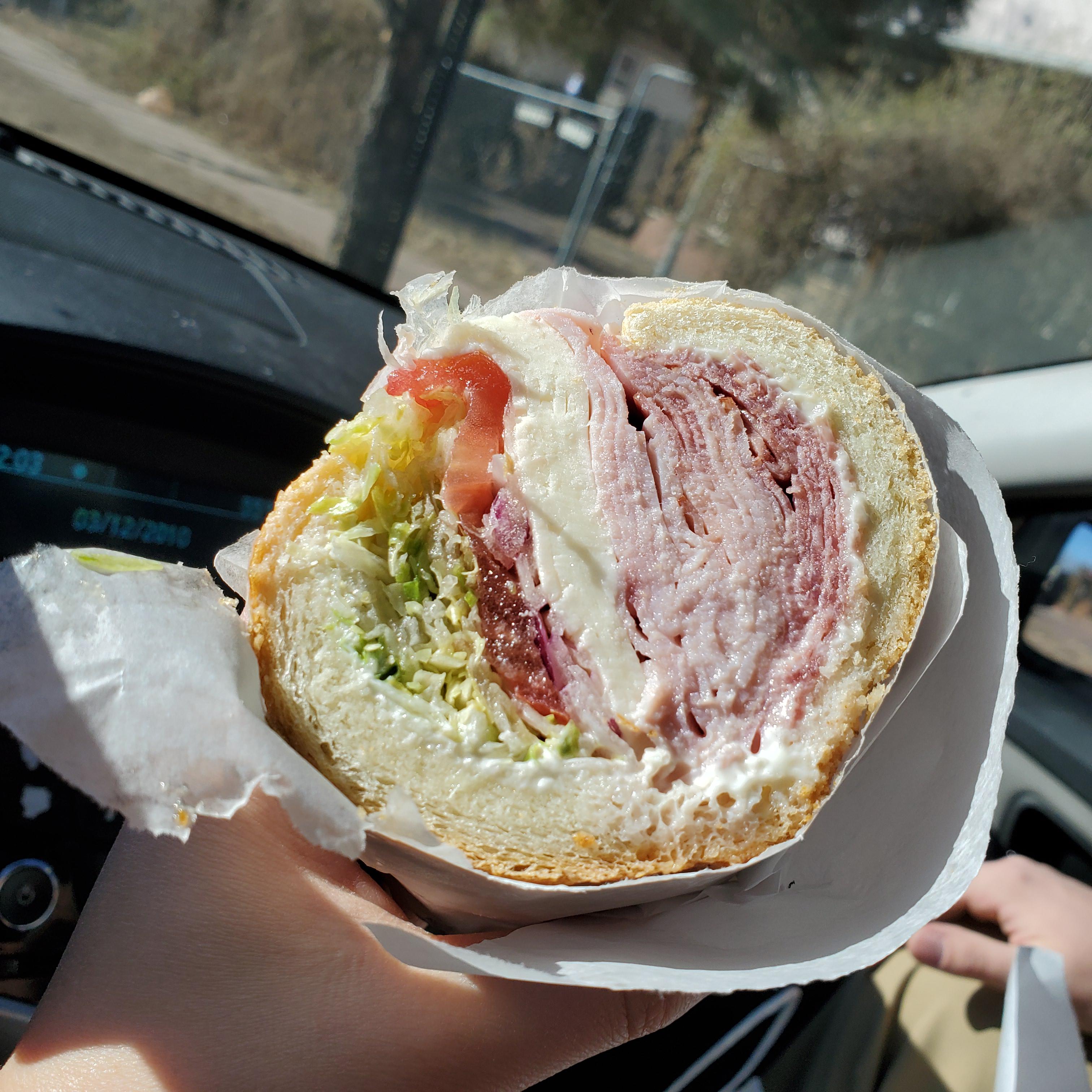 I ate a sandwich packed with salami, capicola, ham, Provolone, LTO