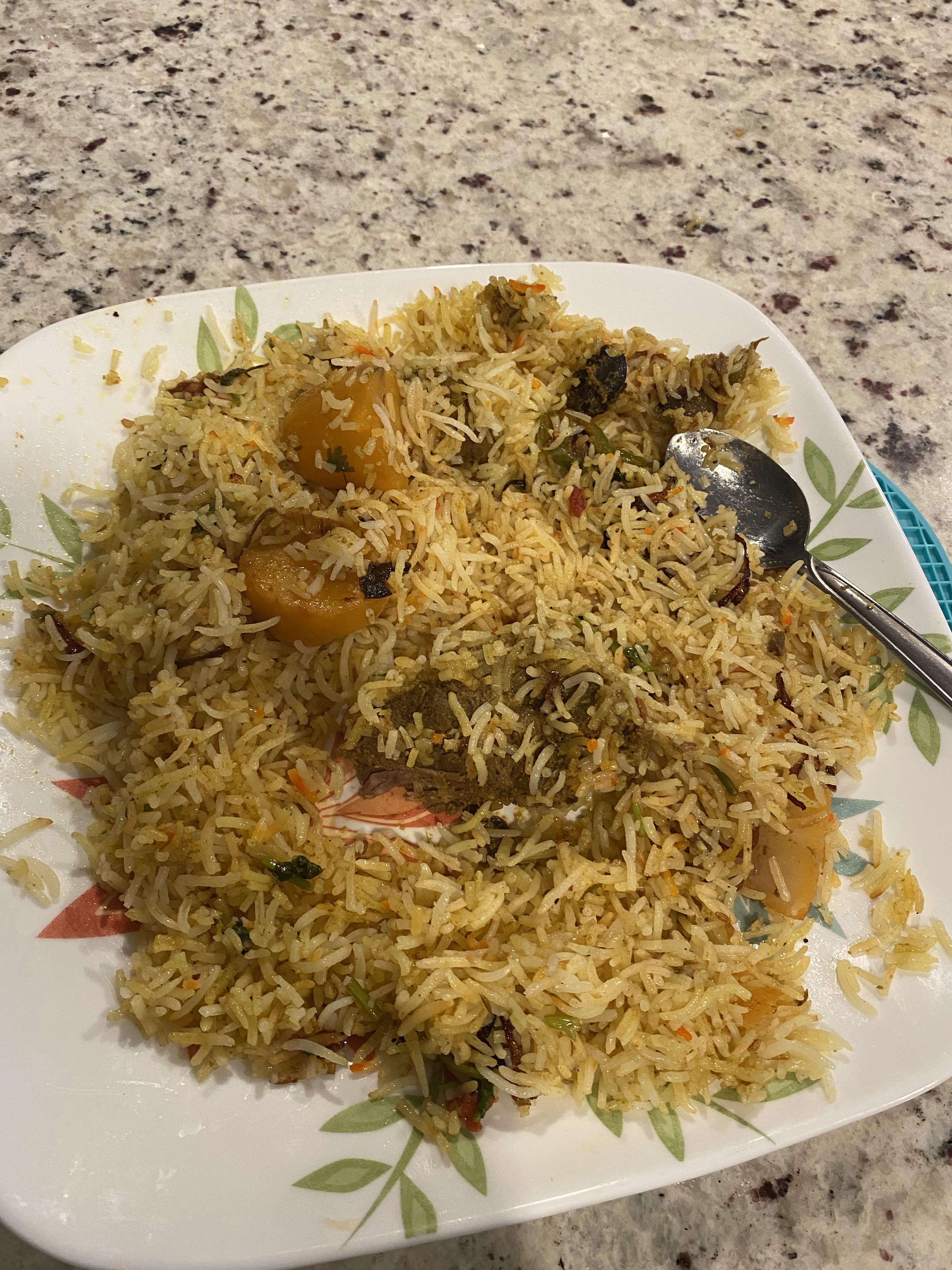 How much caloriea? 1 plate of beef biryani (rice) (brown dish) r