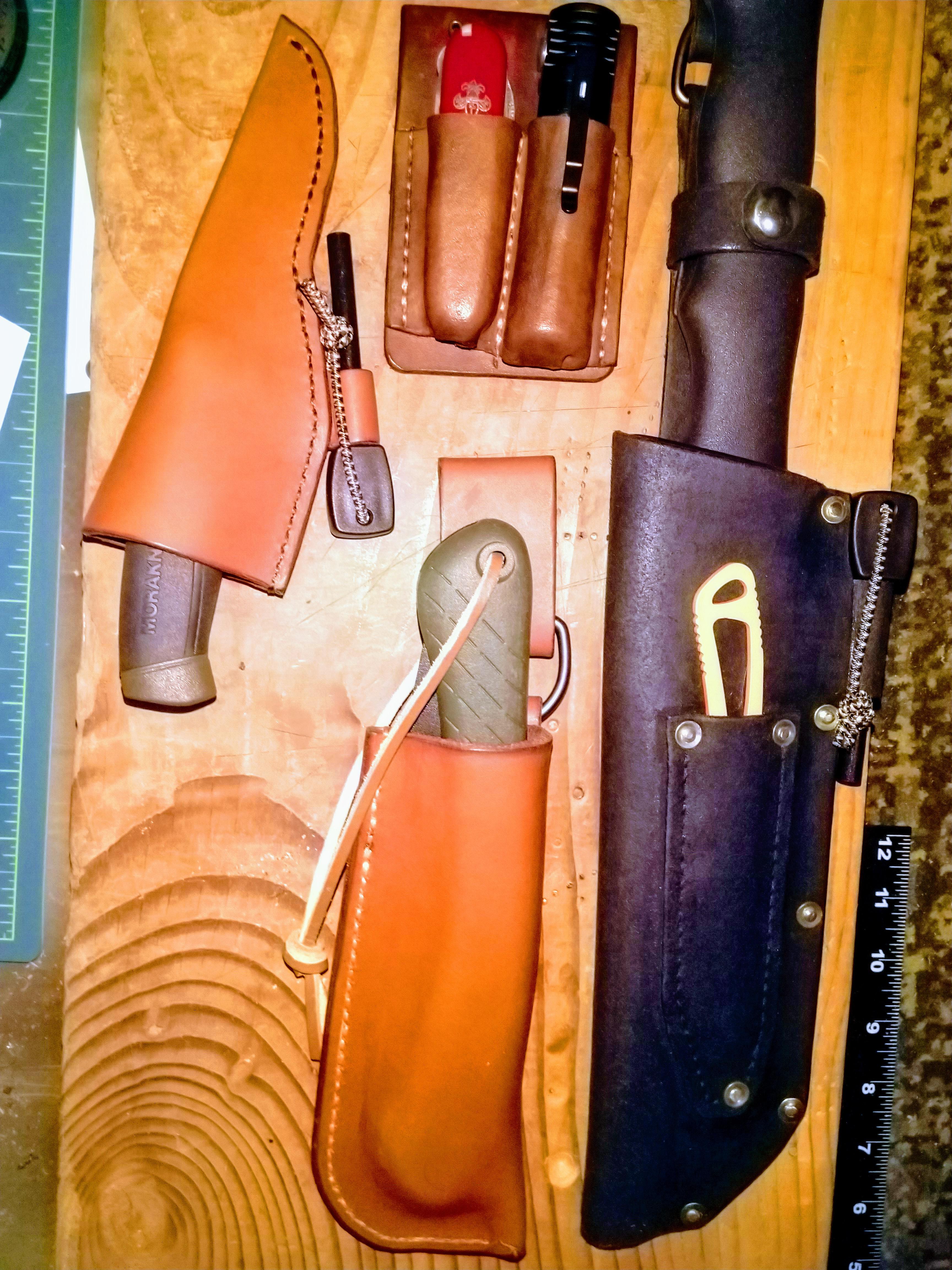 Some tool and knife sheaths I've made. I'm new to the hobby, but feel good about my progress so