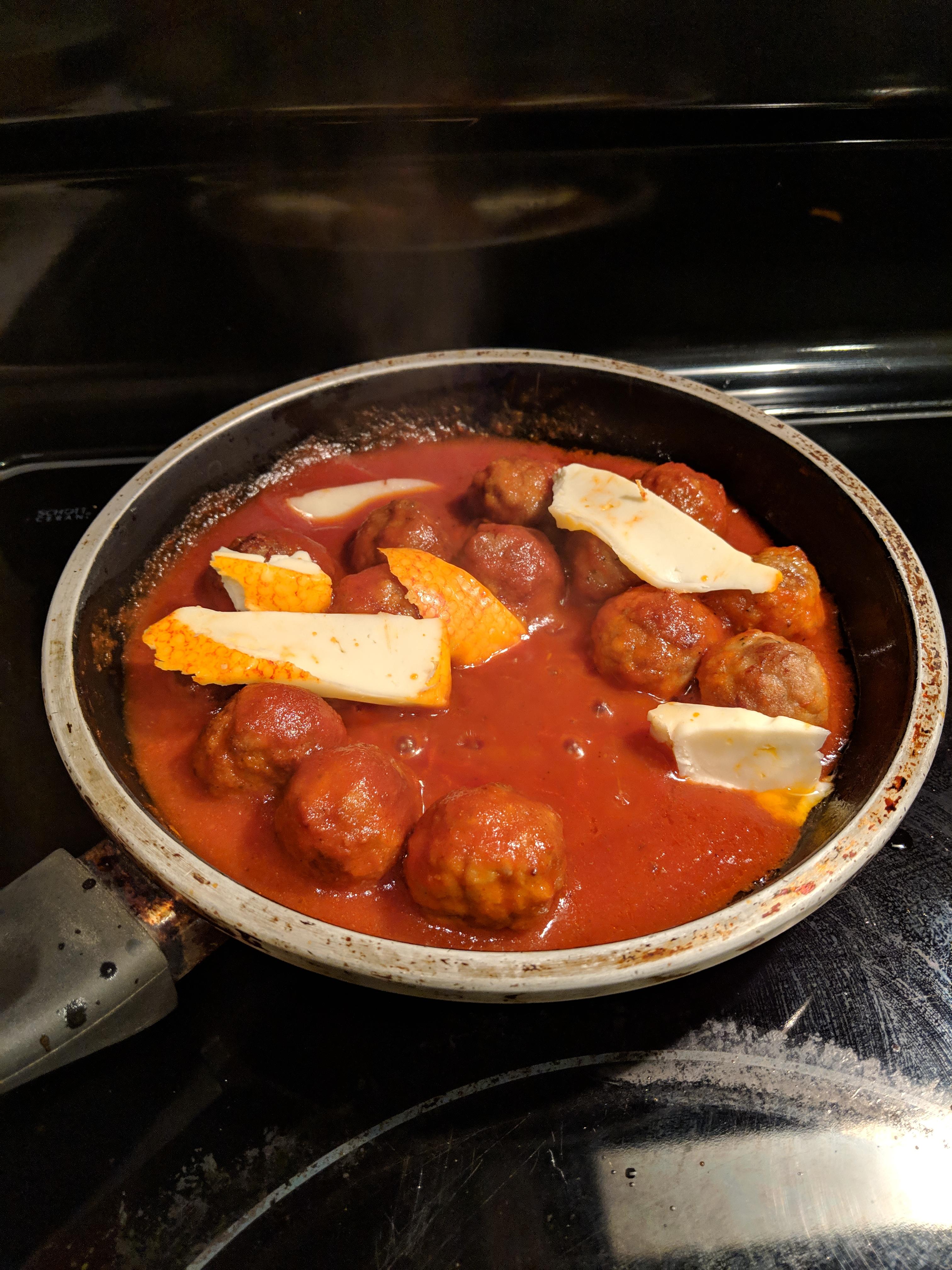Microwave meatballs, Ragu meat sauce, and muenster cheese. r