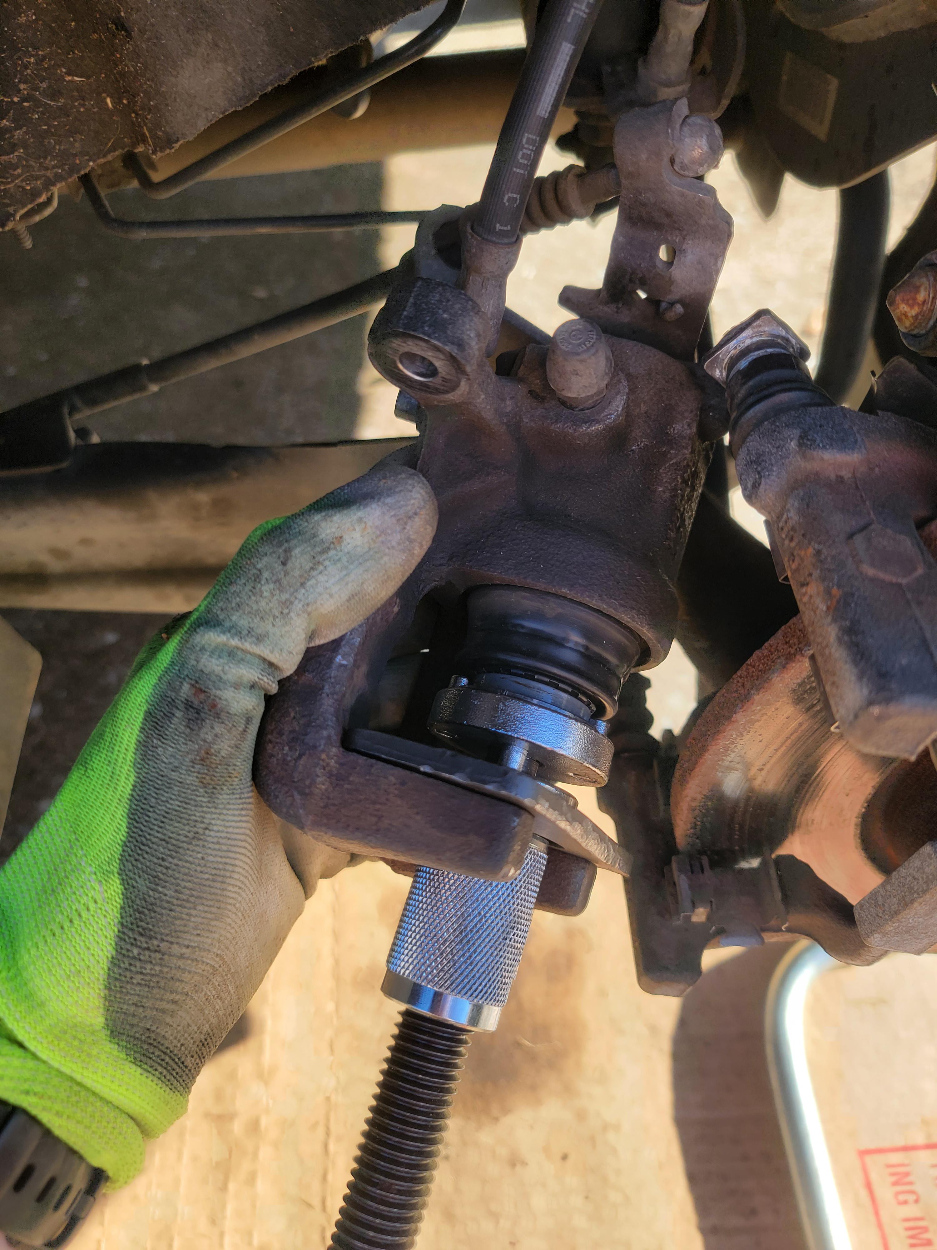 MK6 Golf TDI. Trying to change rear brakes. Is the tool on correctly? Not budging at all! Need