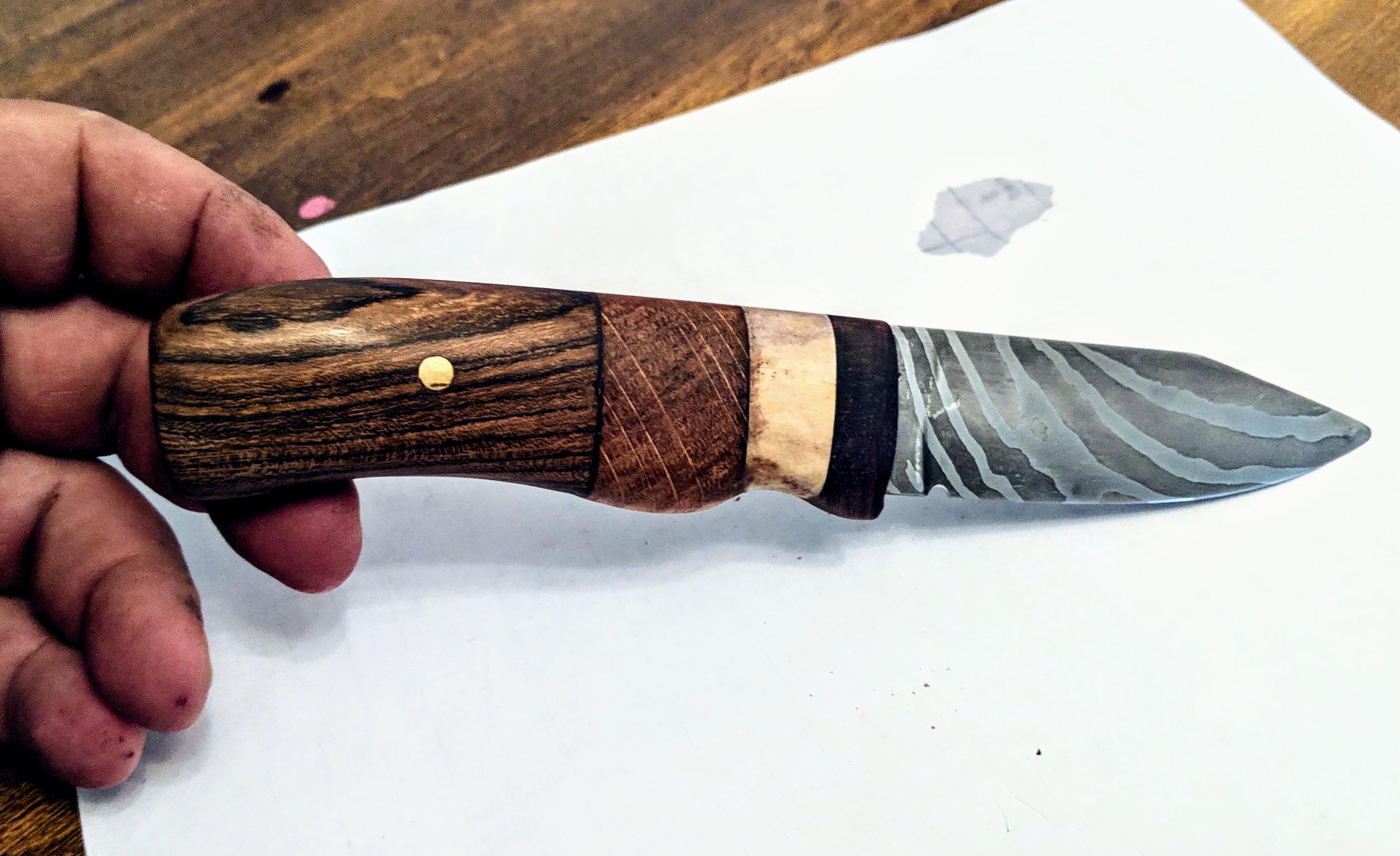 Finished the handle on my latest knife. Walnut, Whiskey Barrel, Antler