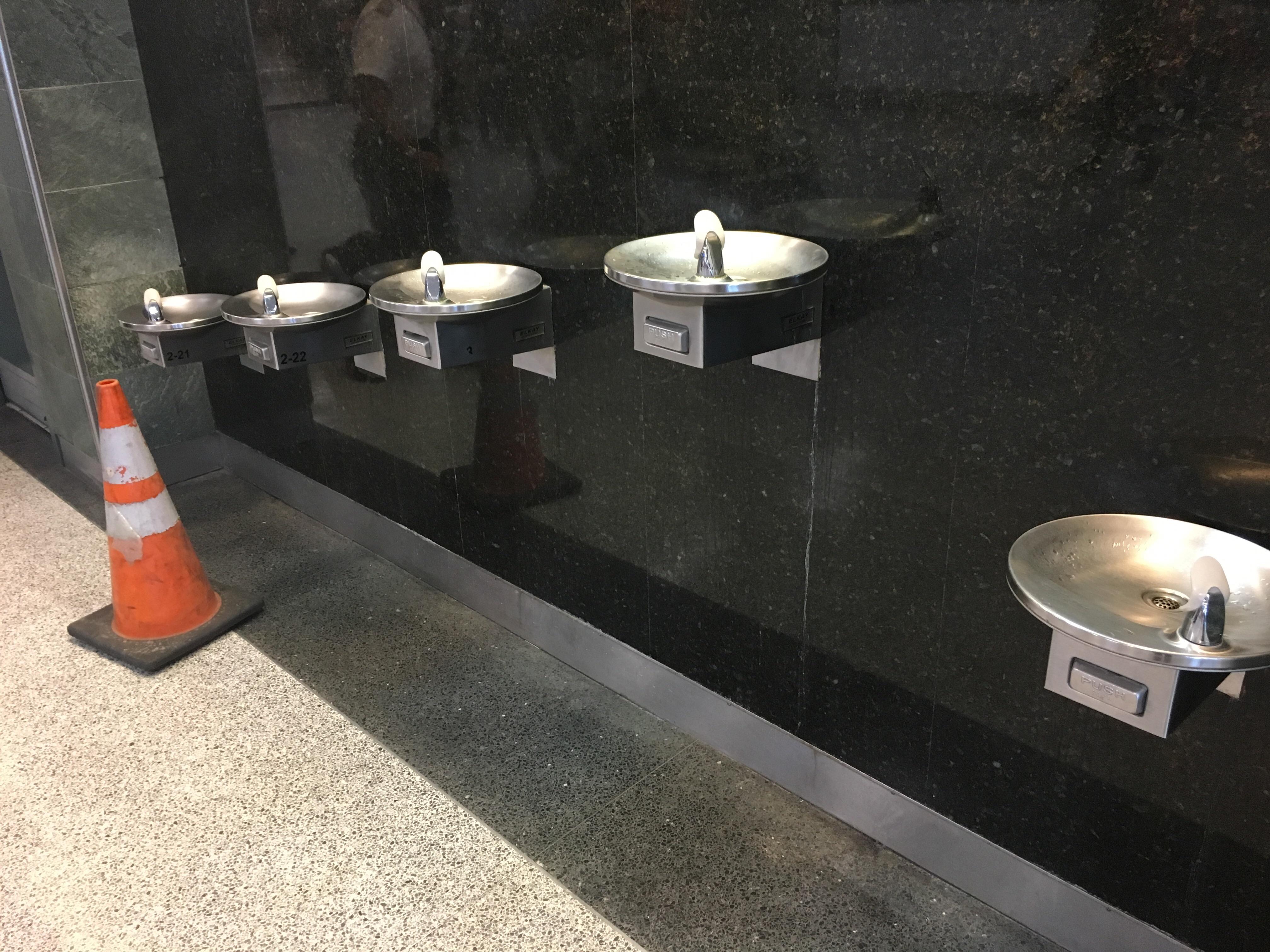 This airport has more than just two heights for drinking fountains. r