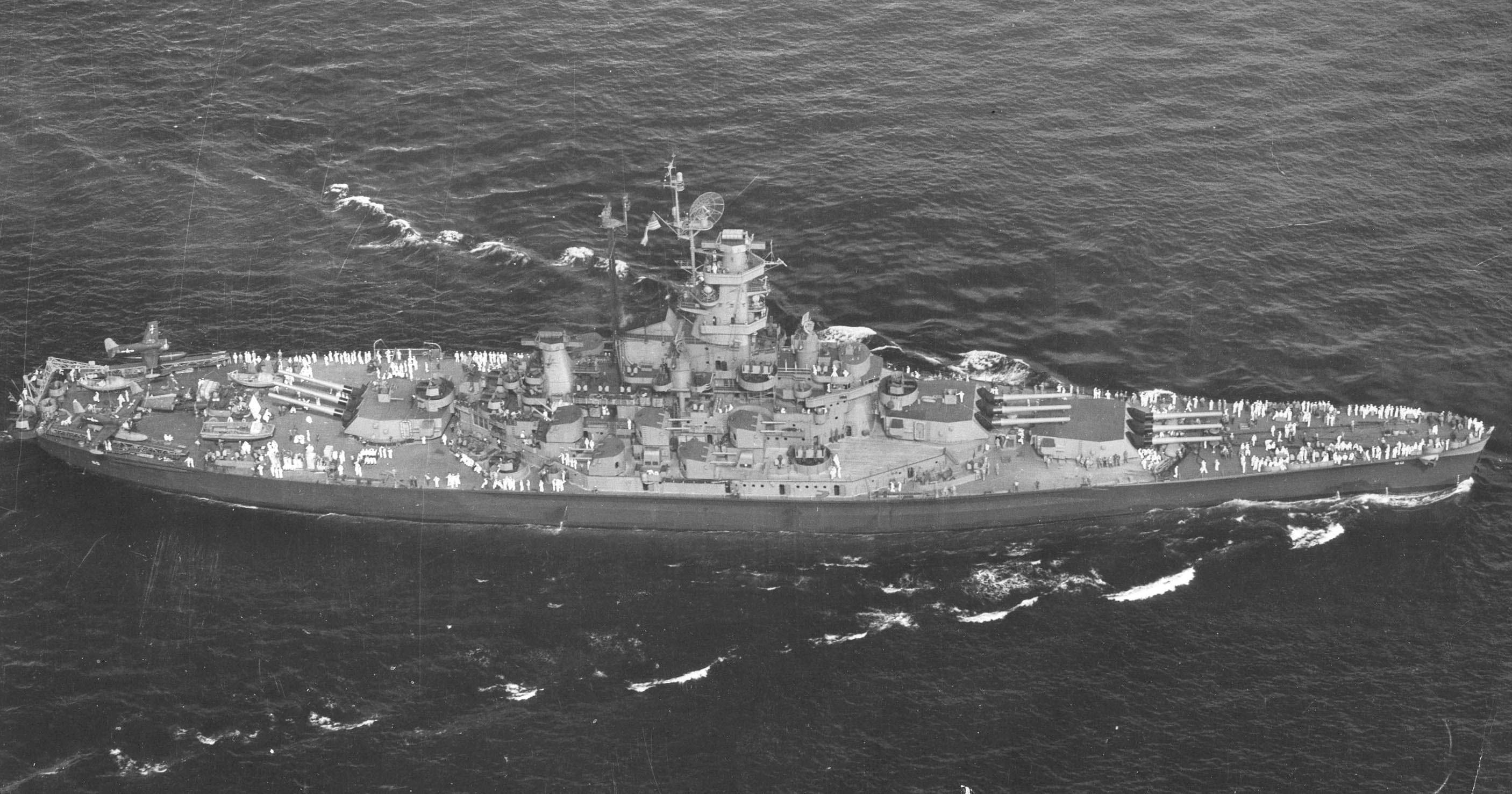Amazing aerial view of USS Alabama (BB 60) as she leaves Pearl Harbor