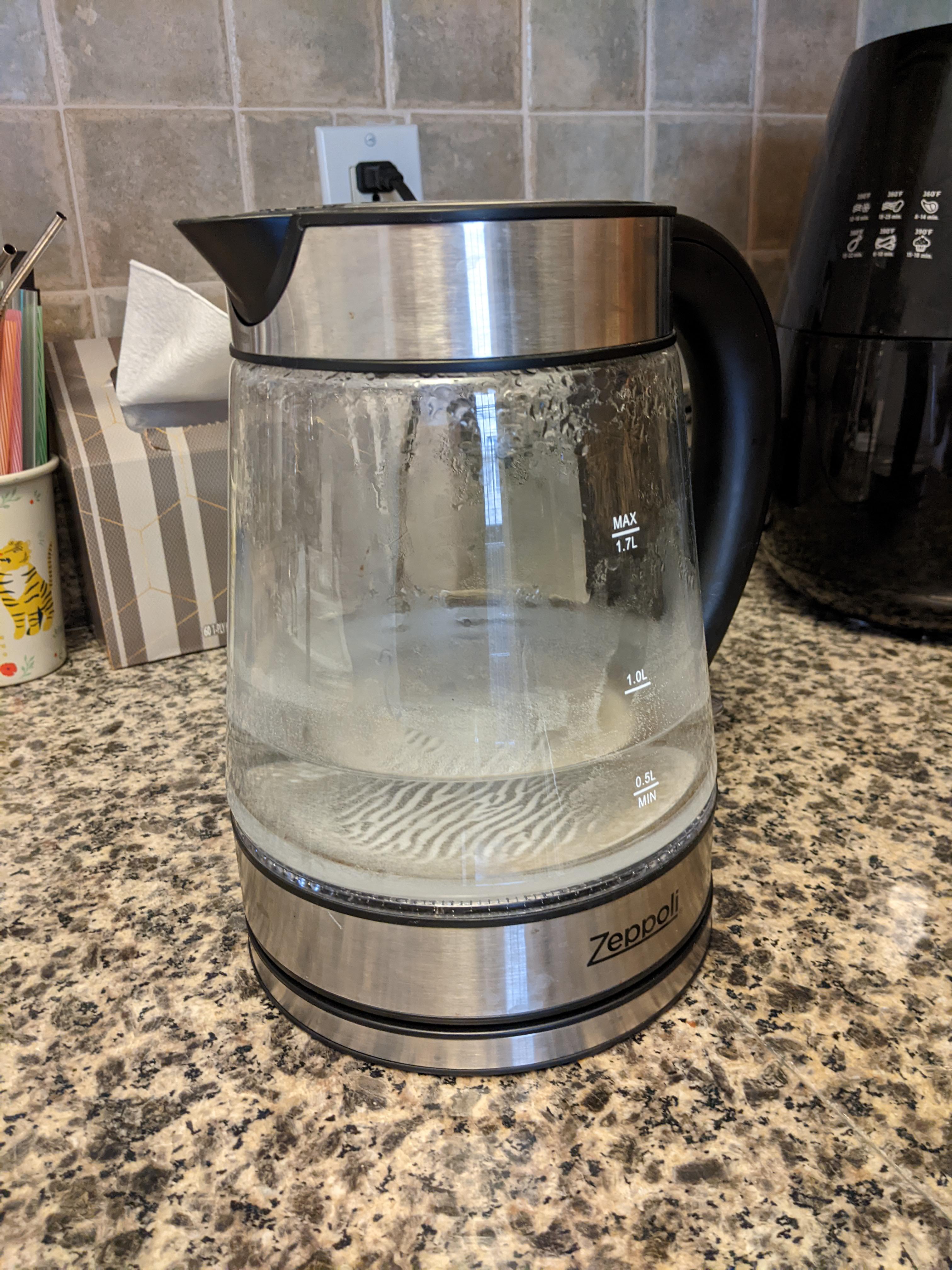 Calcium made zebra stripes in our electric kettle r/mildlyinteresting