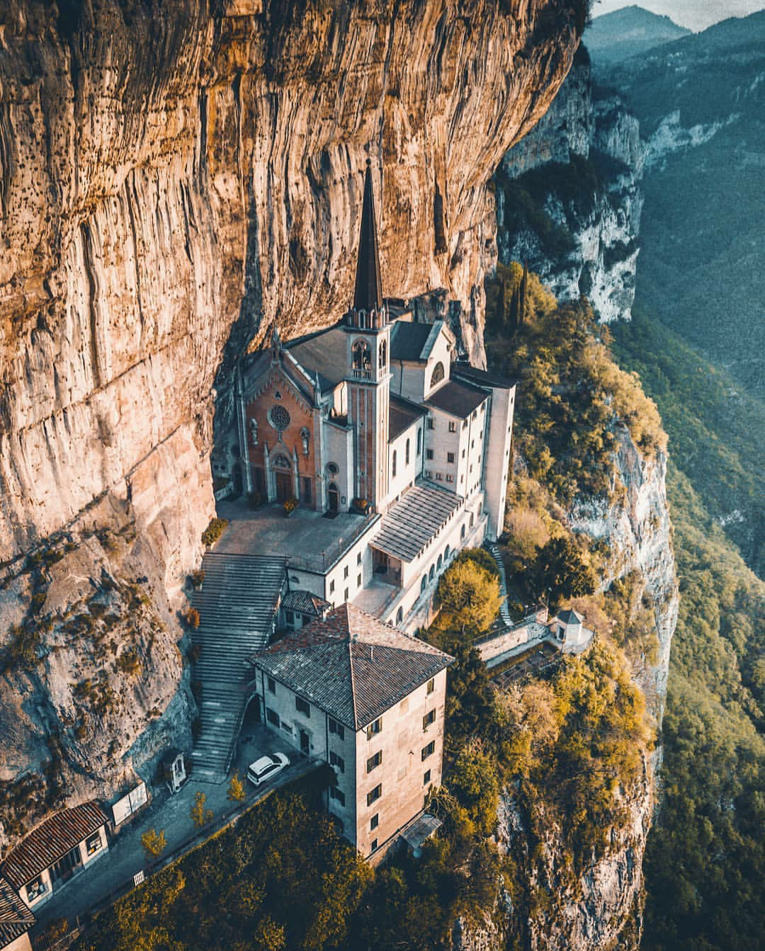 Secluded from civilization. This mountainside church in Italy is a rare