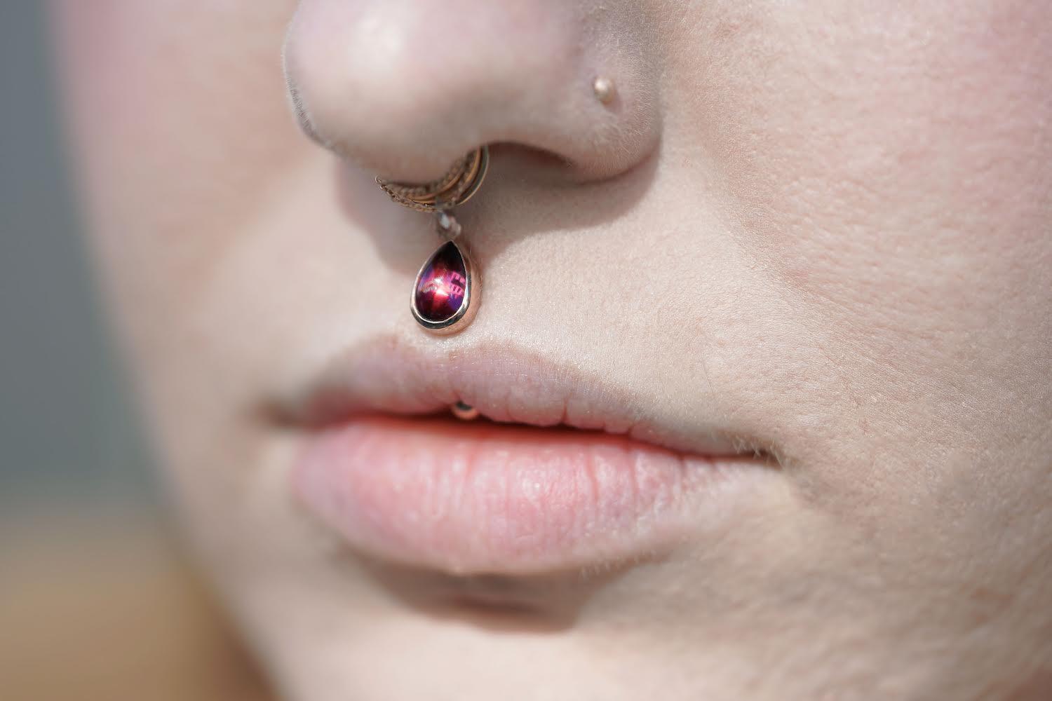 New vertical philtrum jewelry! Rhodolite pear set in rose gold