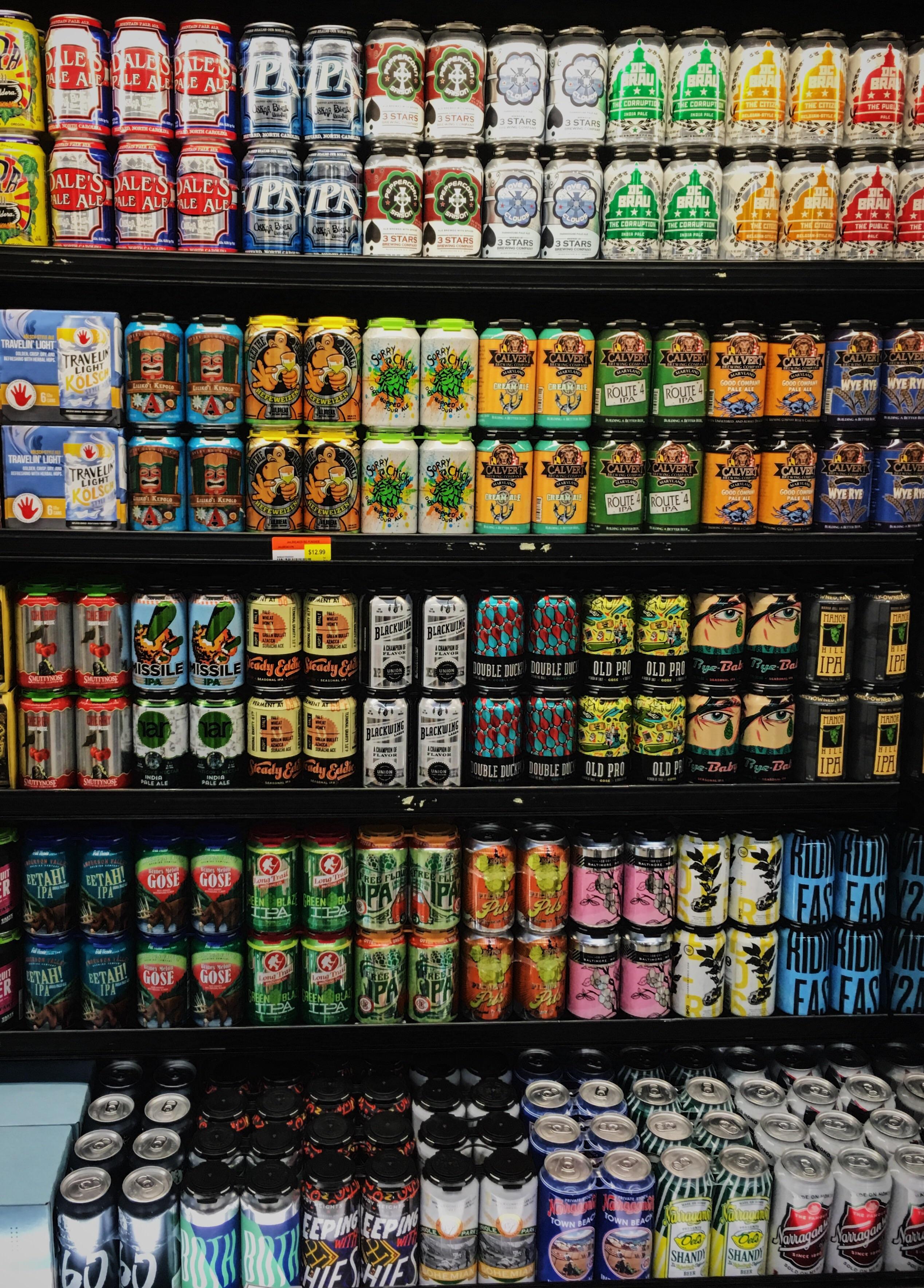 Switched up the cooler at work. That one random price tag is really bothering me. r/MDbeer