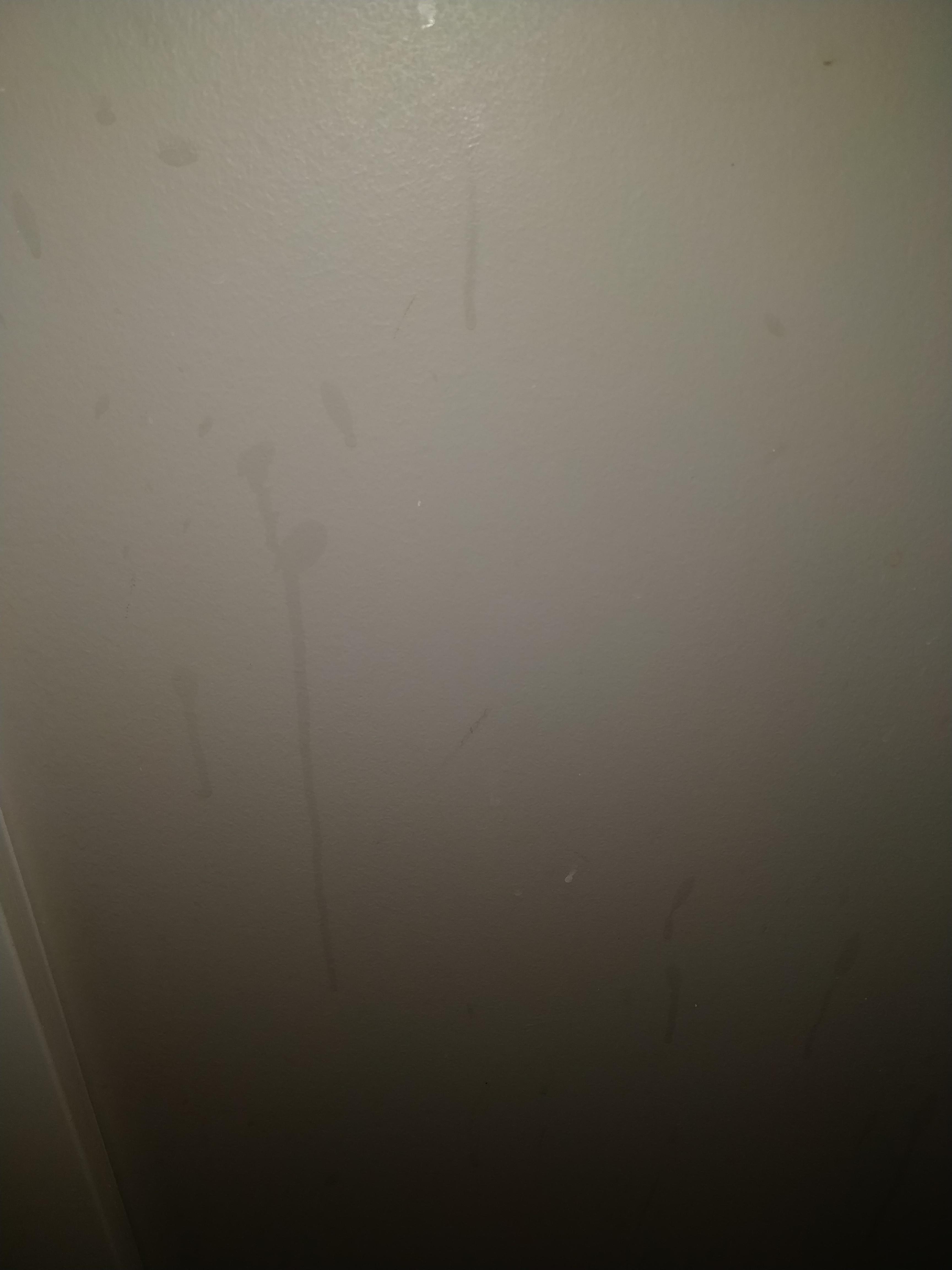 Anyone know what these drip marks next to my bathroom sink are and how to clean them without