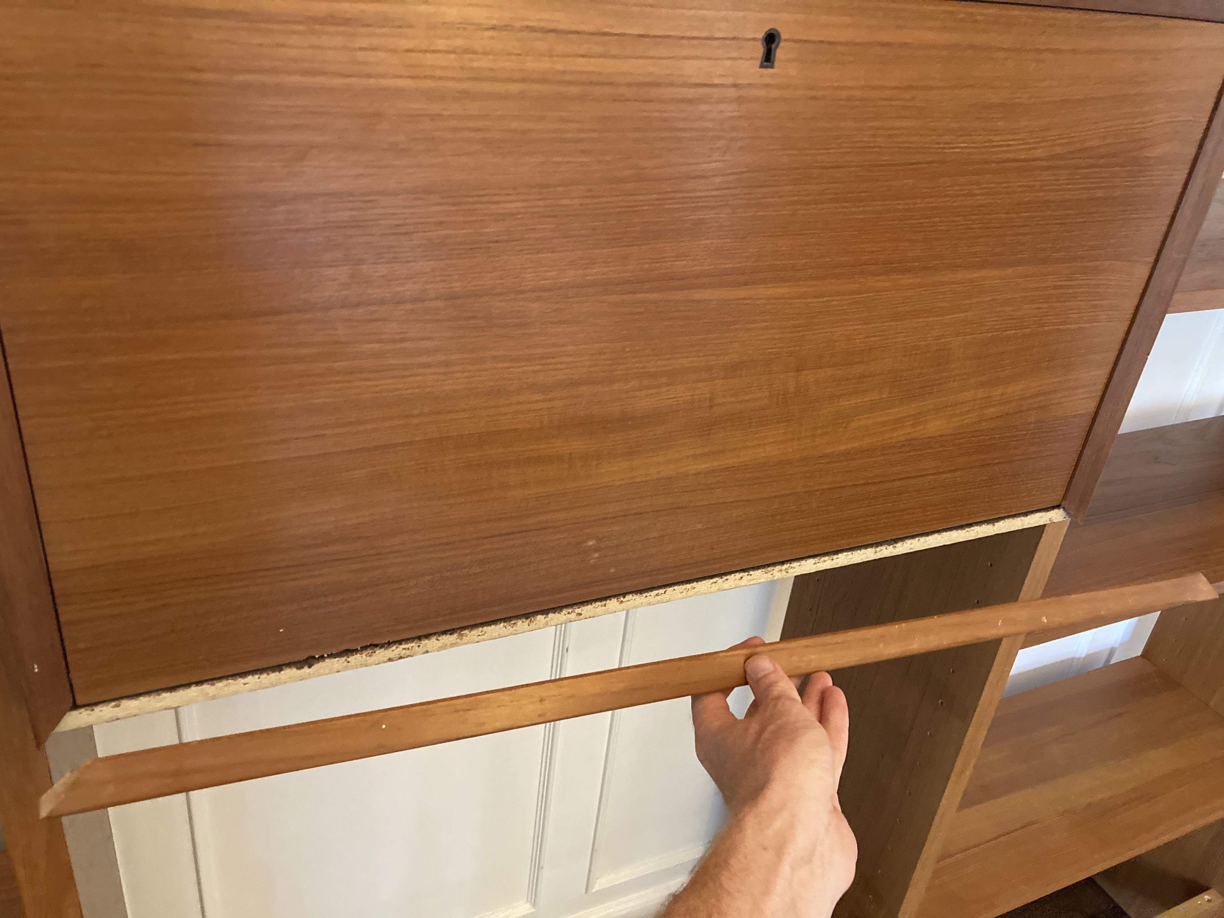 Movers broke the molding off this teak bar. I have Gorilla wood glue