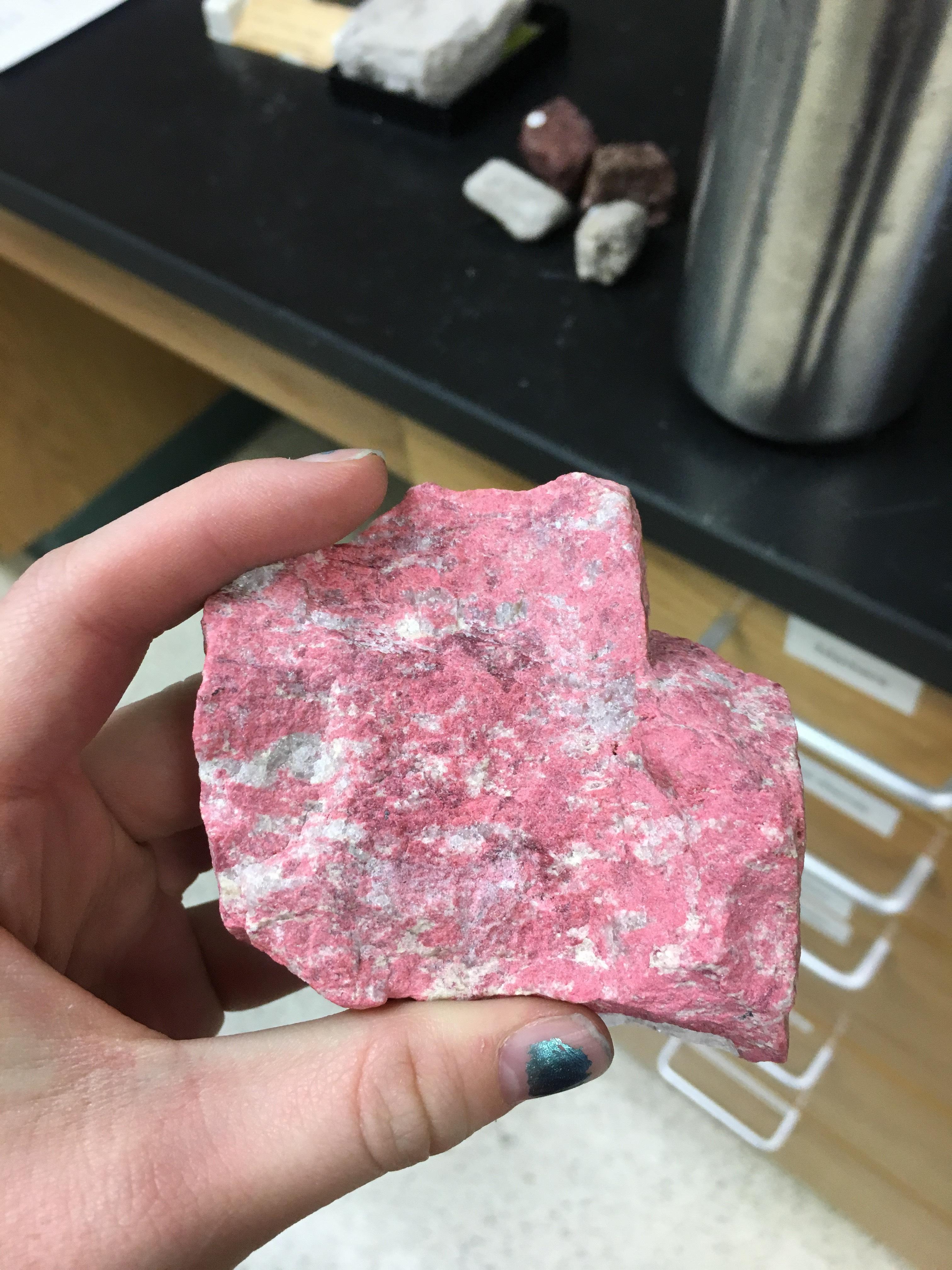 help ID a pink rock? found while cleaning my school's rock room, does