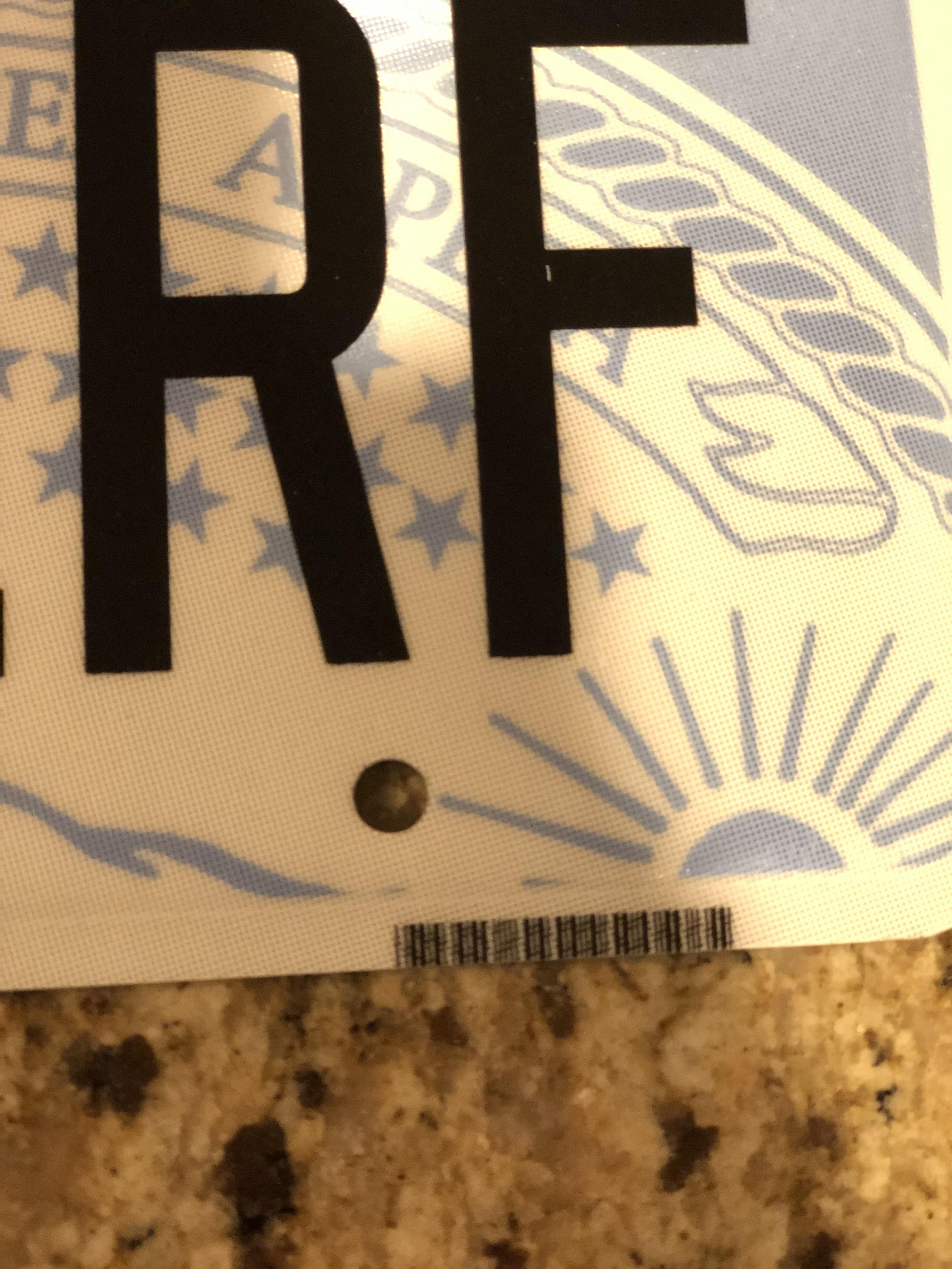 New KS license plates. No raised letters. Anyone know if the bar code