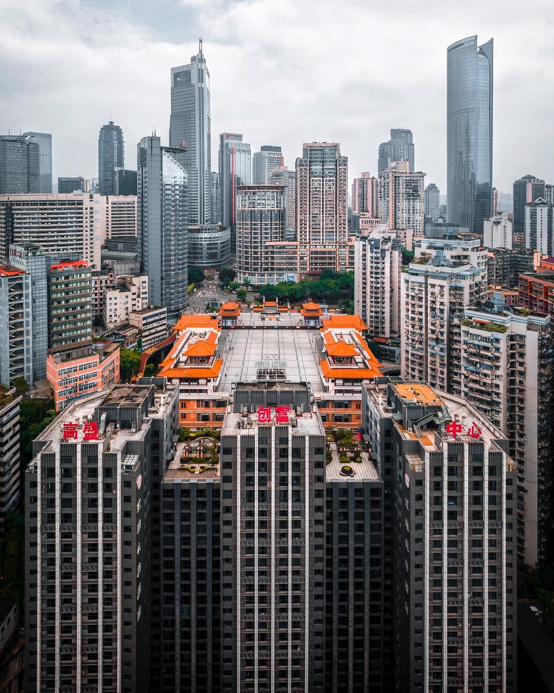 Rooftop of a building that doubles as a plaza connected to a road at the same level in