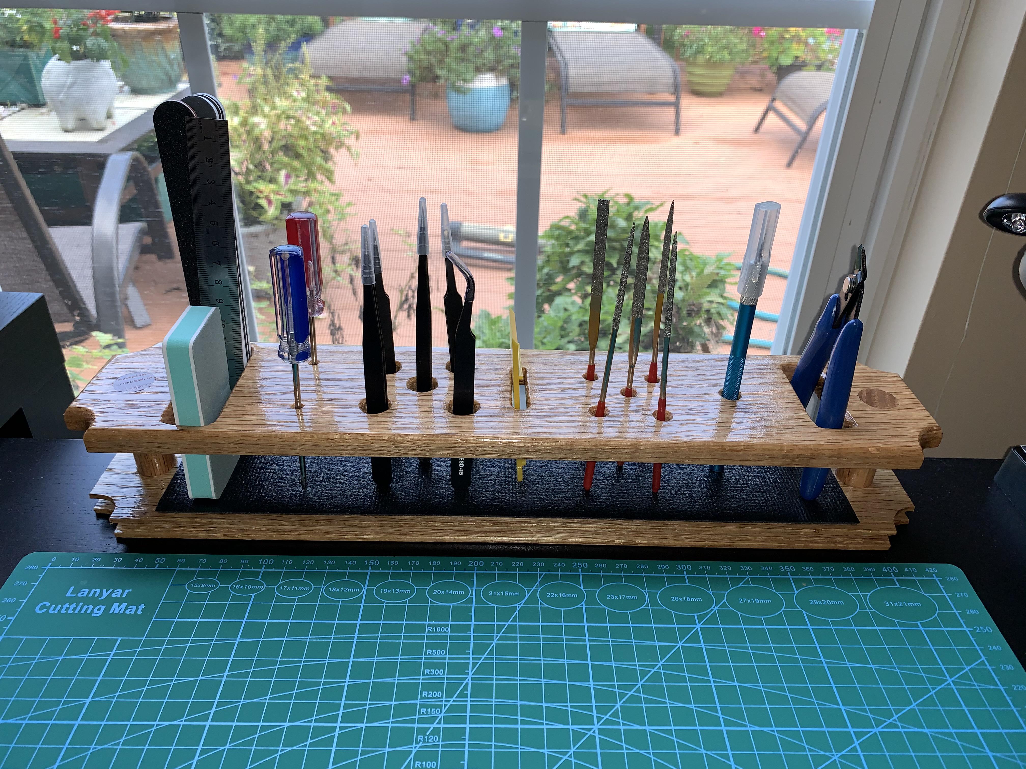 Home made tool holder! Cut from oak with a drawer lining on the