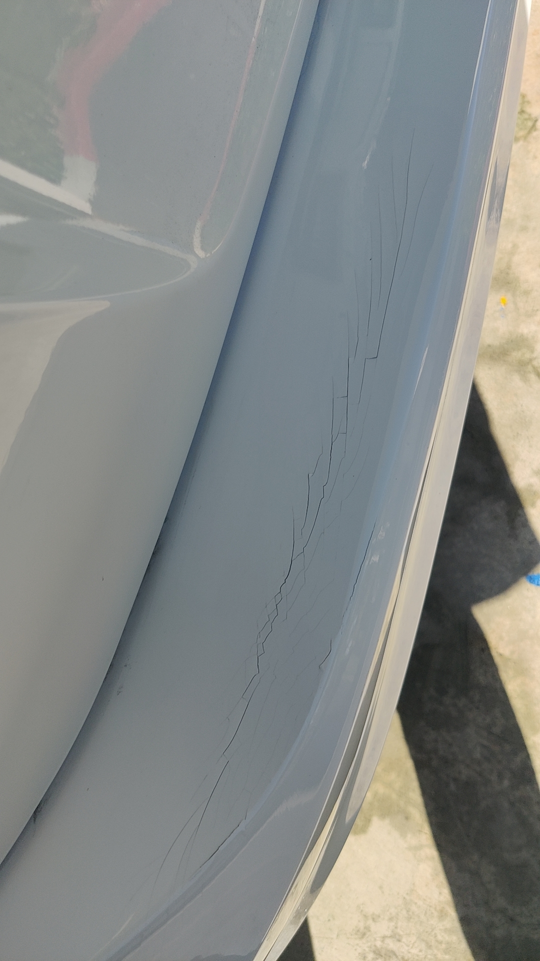 minor rear bumper collision caused the fresh paint on my bumper the