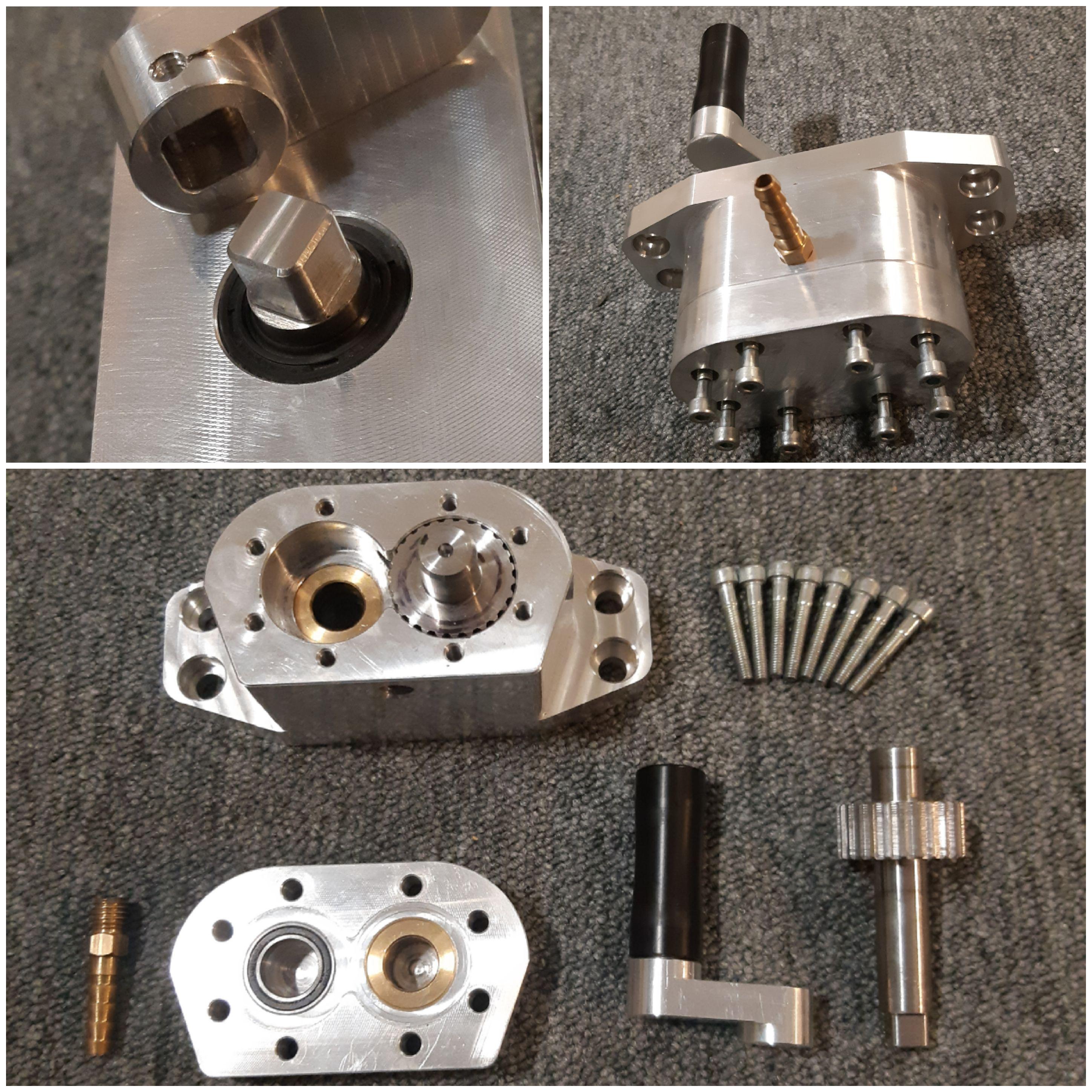 An external gear pump i made a while back. tolerance between the gears
