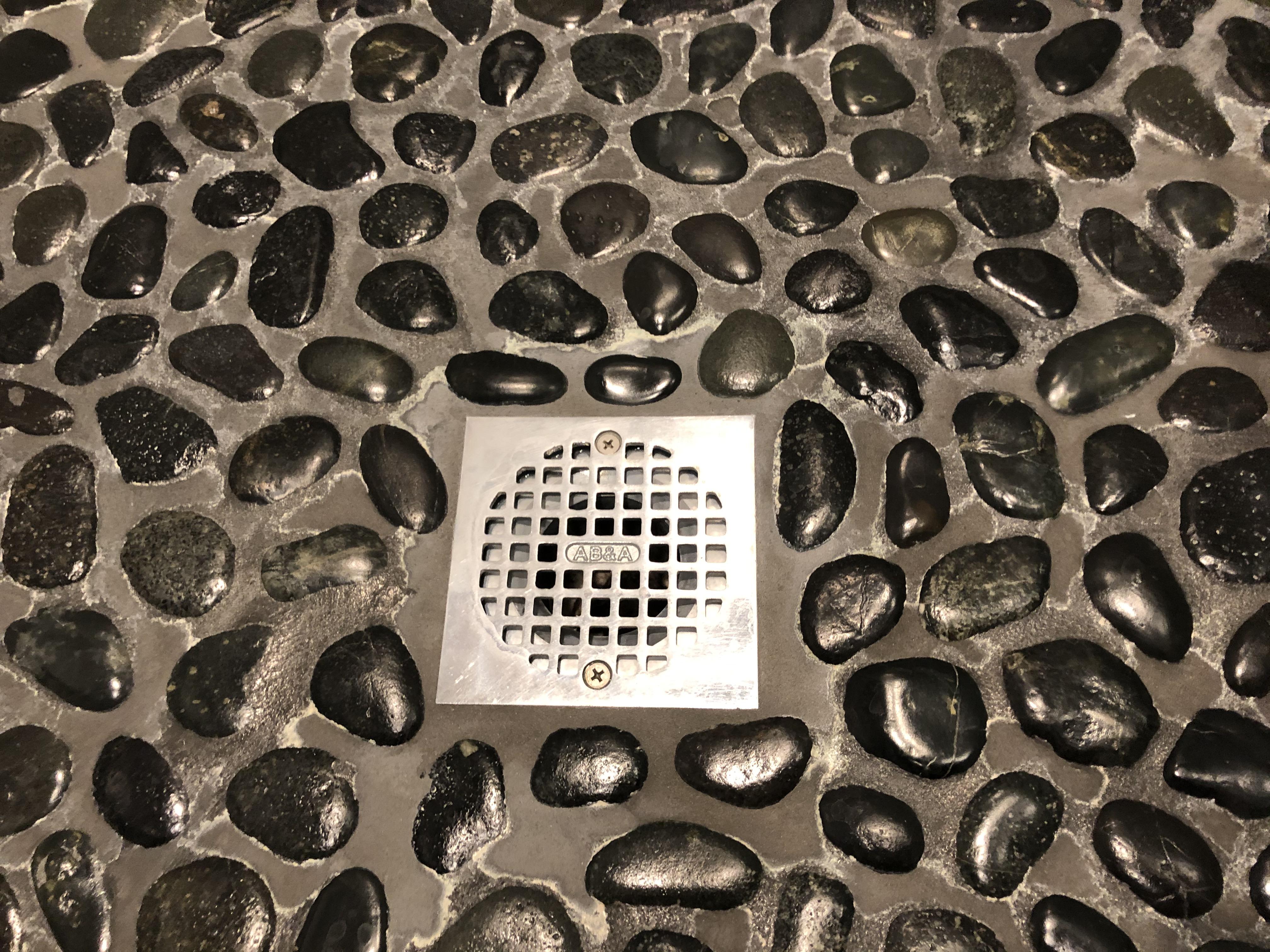 I used Drano to unclog my shower drain, and it has damaged the grout