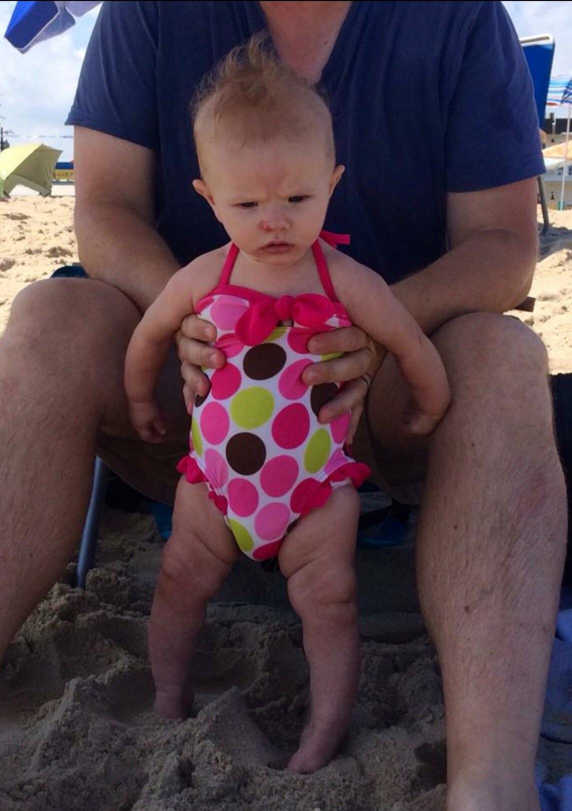 PsBattle This picture of a baby that hates the beach!