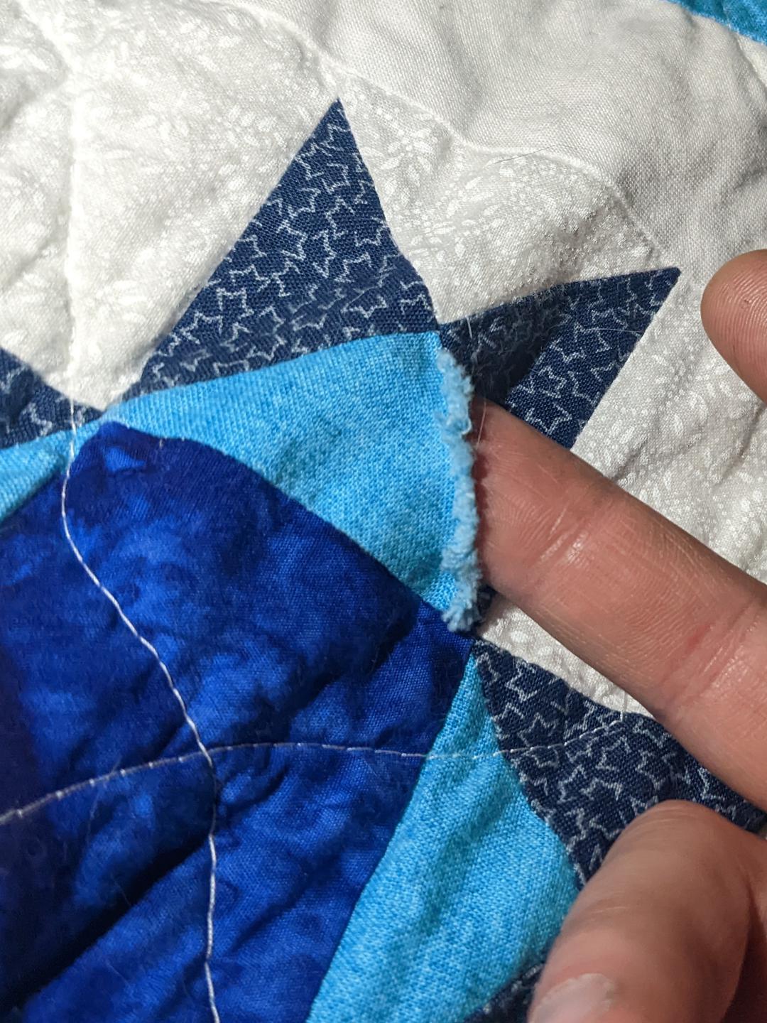 How to repair seems in a finished quilt r/quilting