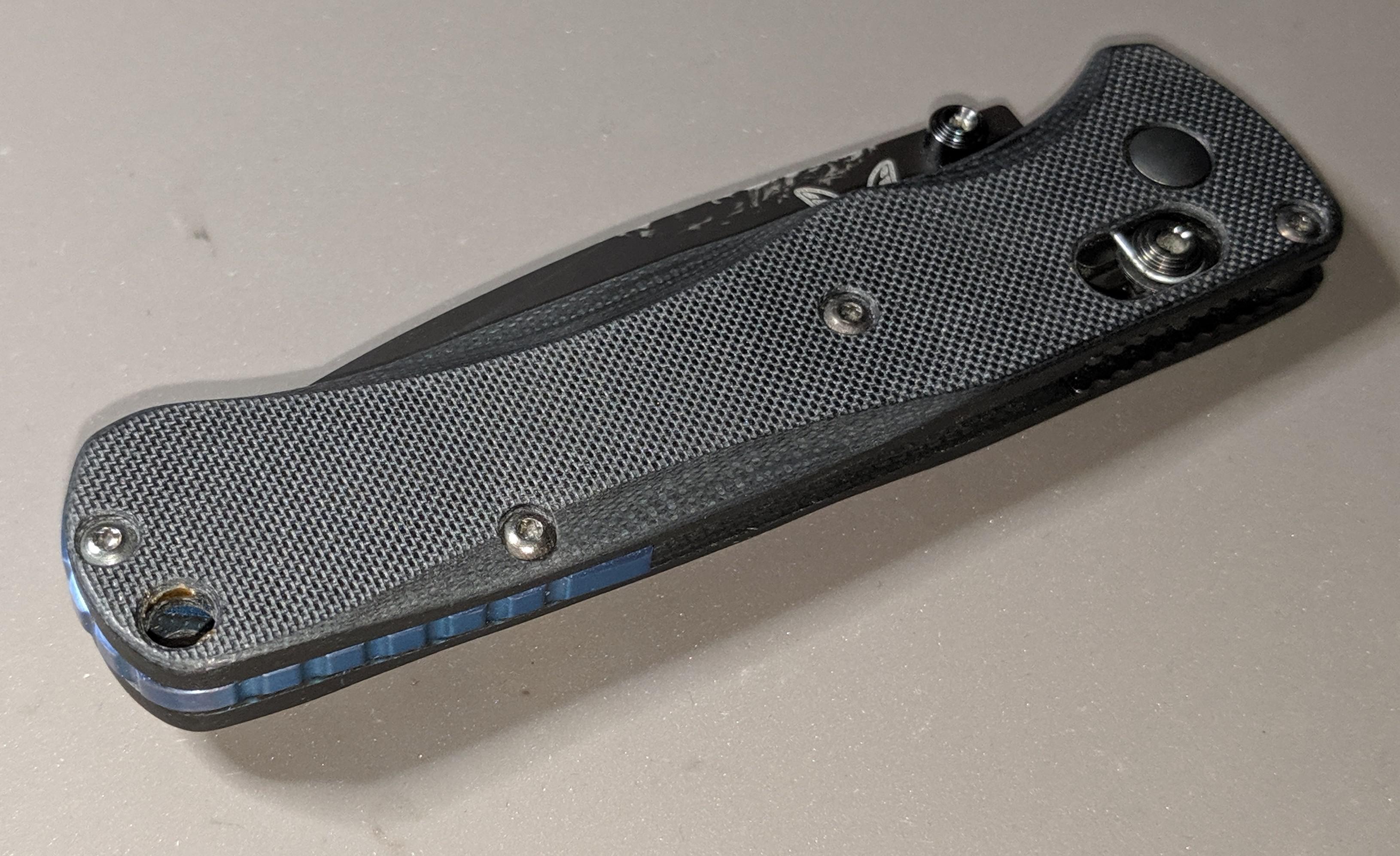 Rouge blade works G10 scales with rock scale TI Ano backspacer. r