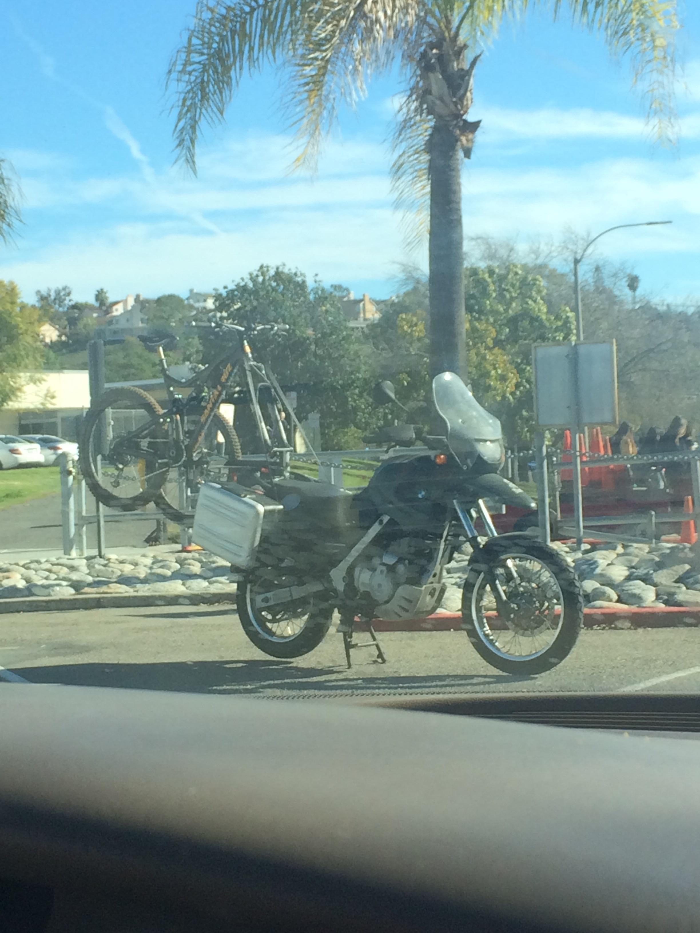 A motorcycle carrying a bicycle r/mildlyinteresting