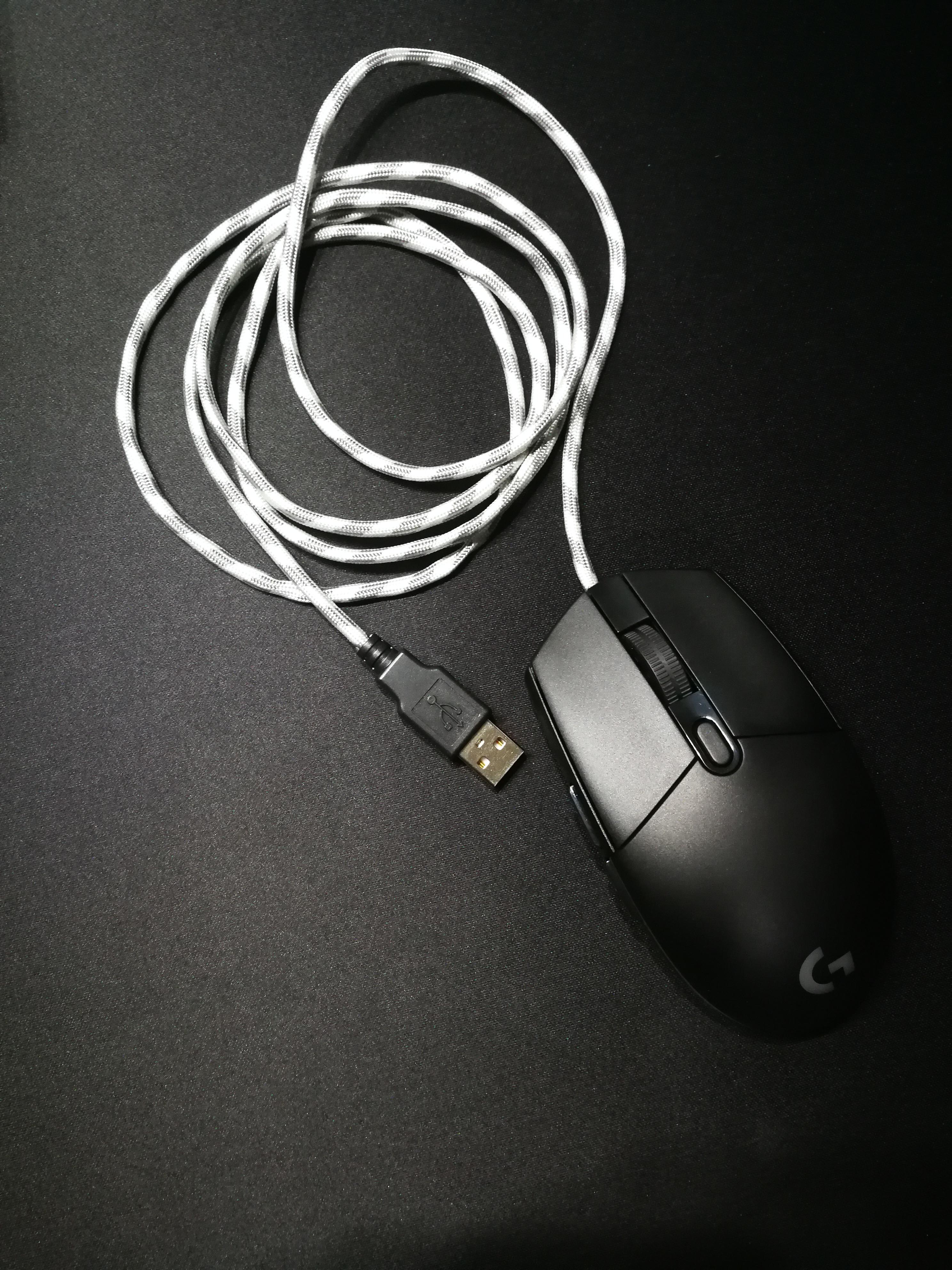 My first ever mouse modding experience. The paracord cable really makes