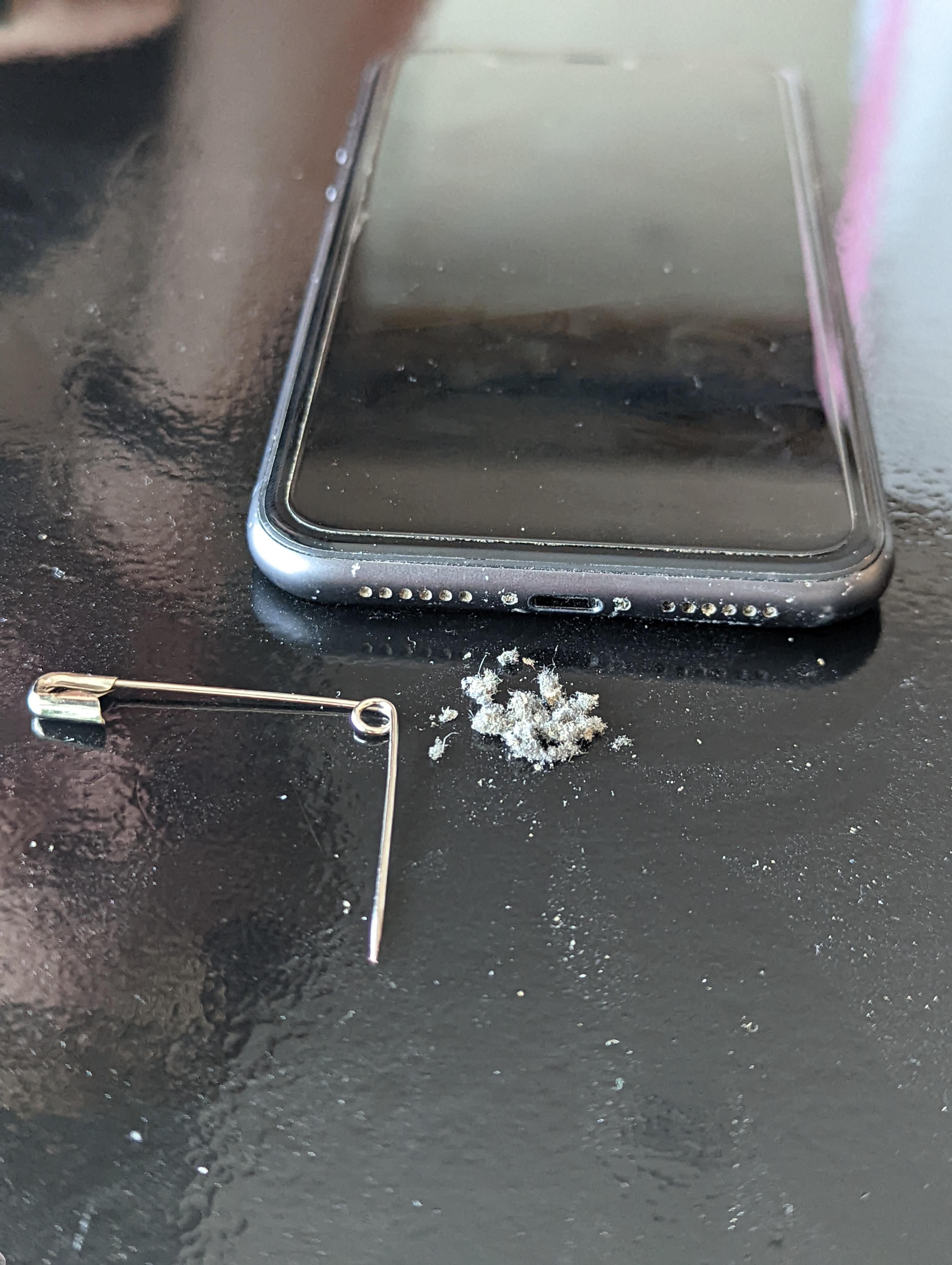 the amount of pocket lint that was stuck in the charging hole