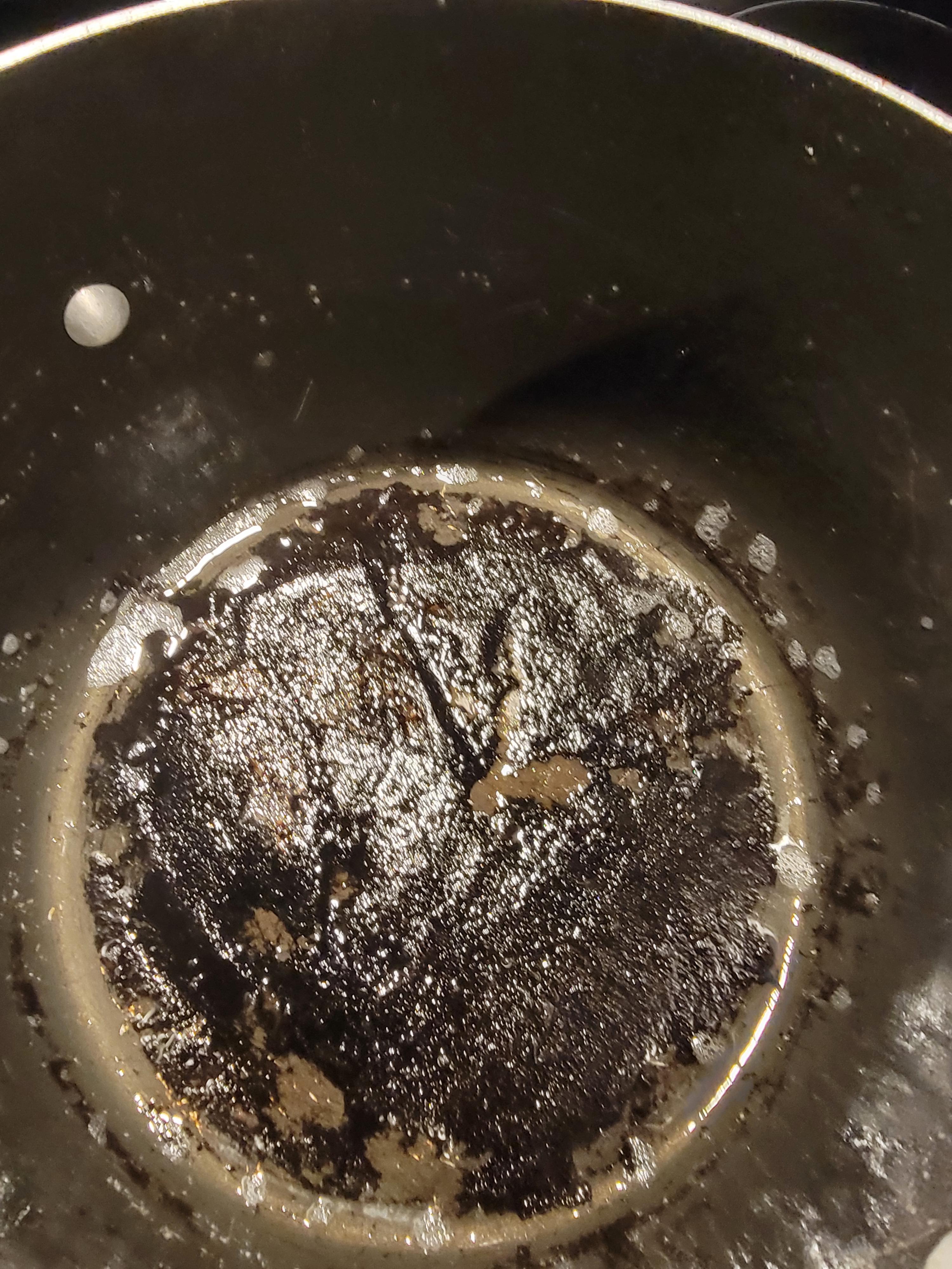 How do I clean the heavily burnt food residue out of this pot? r