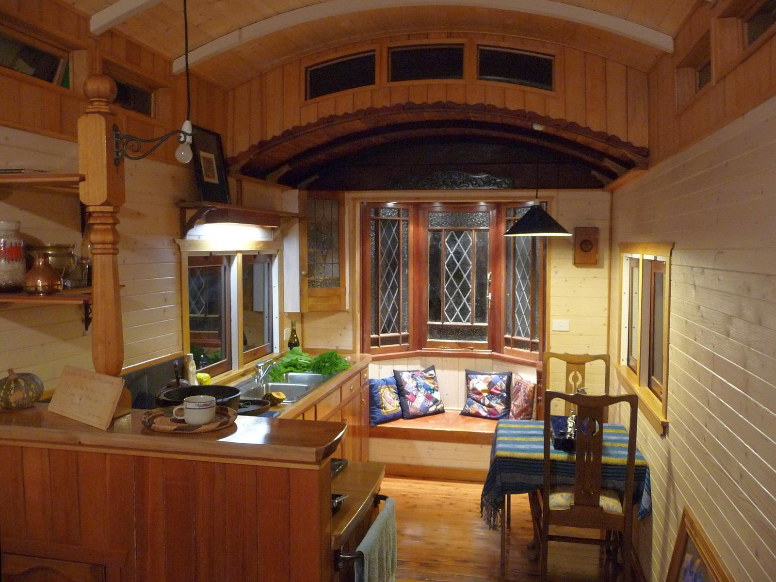 Inside a converted caboose r/CozyPlaces