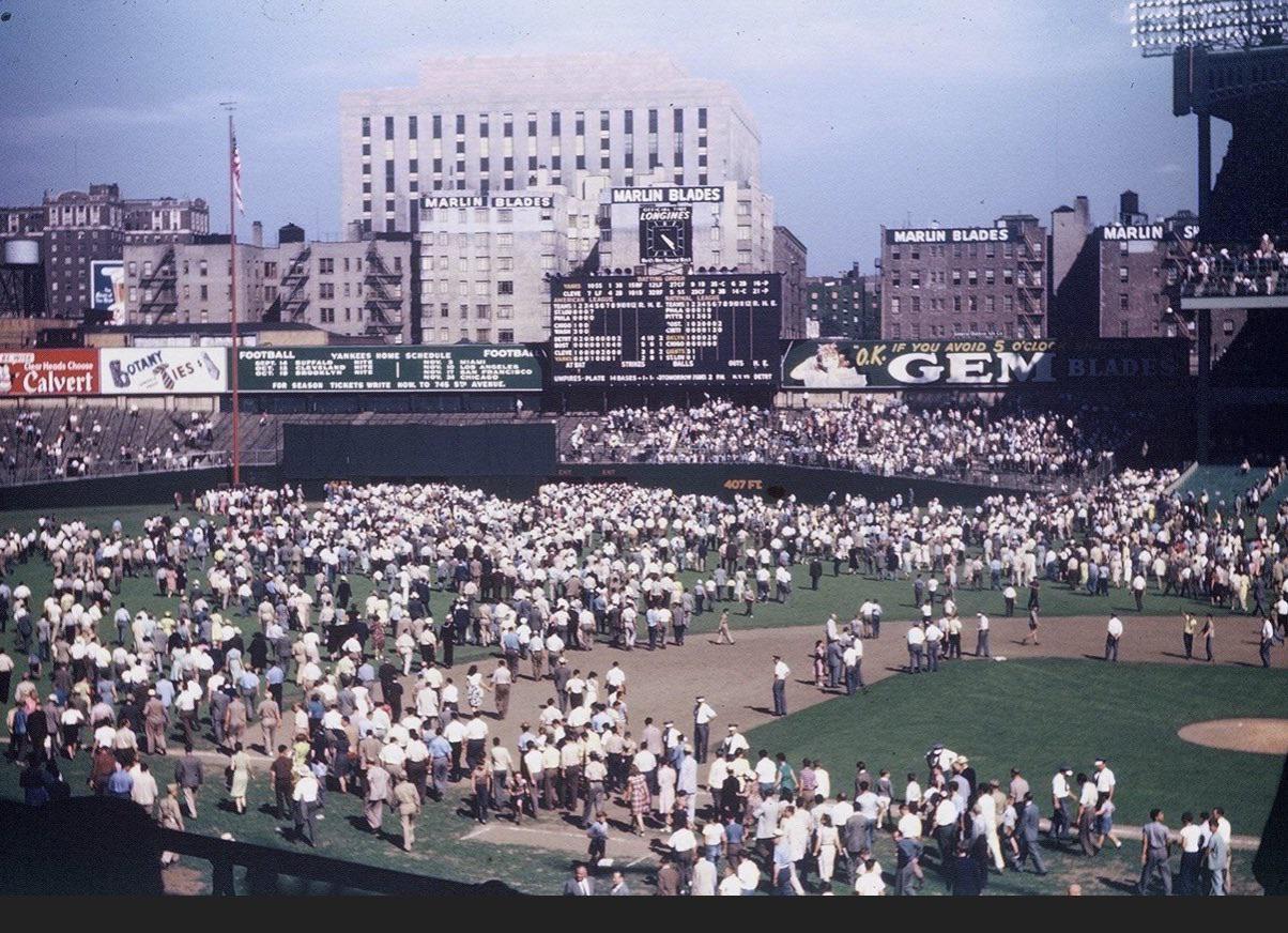 Fans exiting the game via the field at Yankee Stadium in 1946 r/baseball