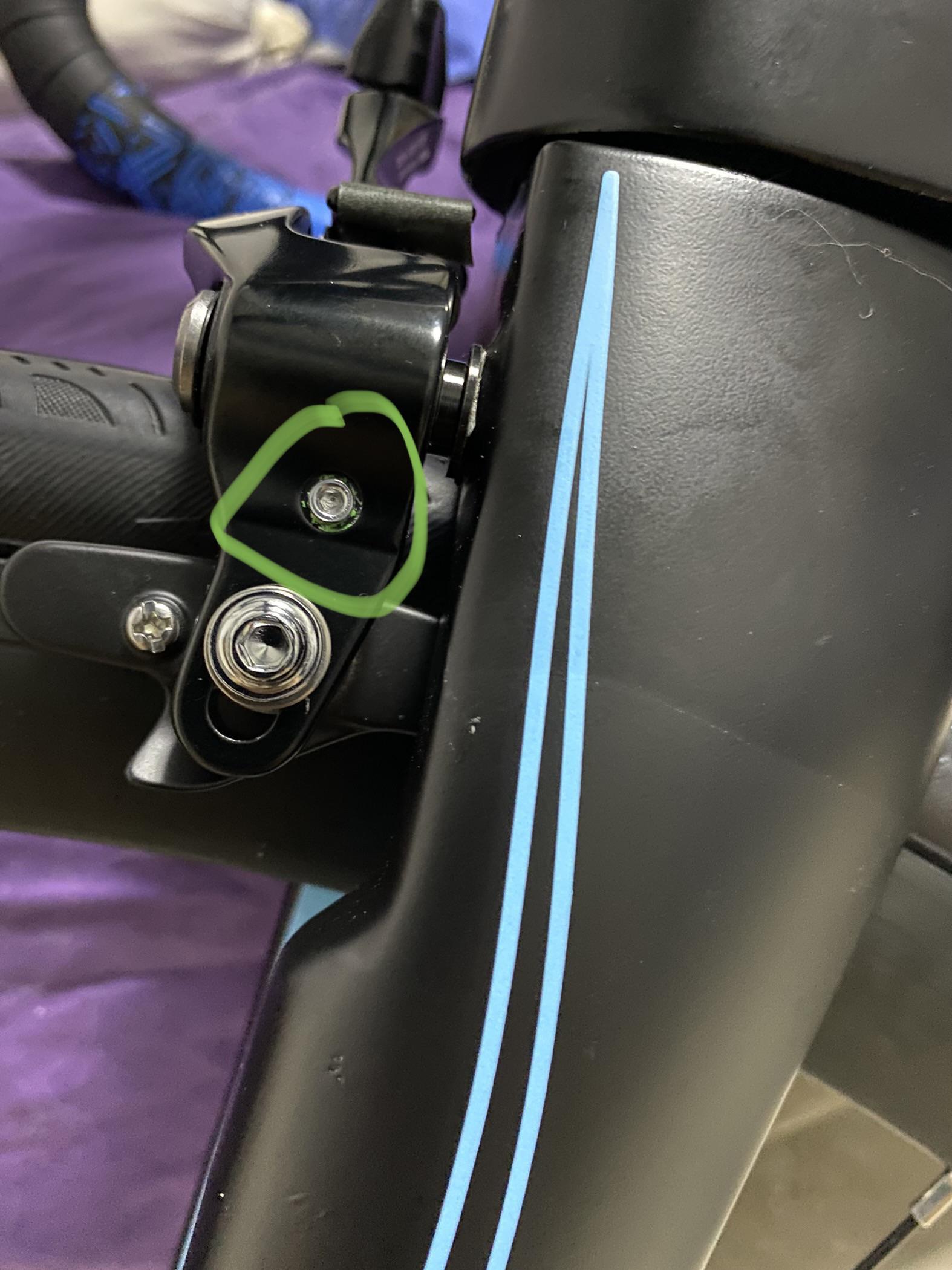 Front Rim brake centering bolt. How to remove? Seems striped. All