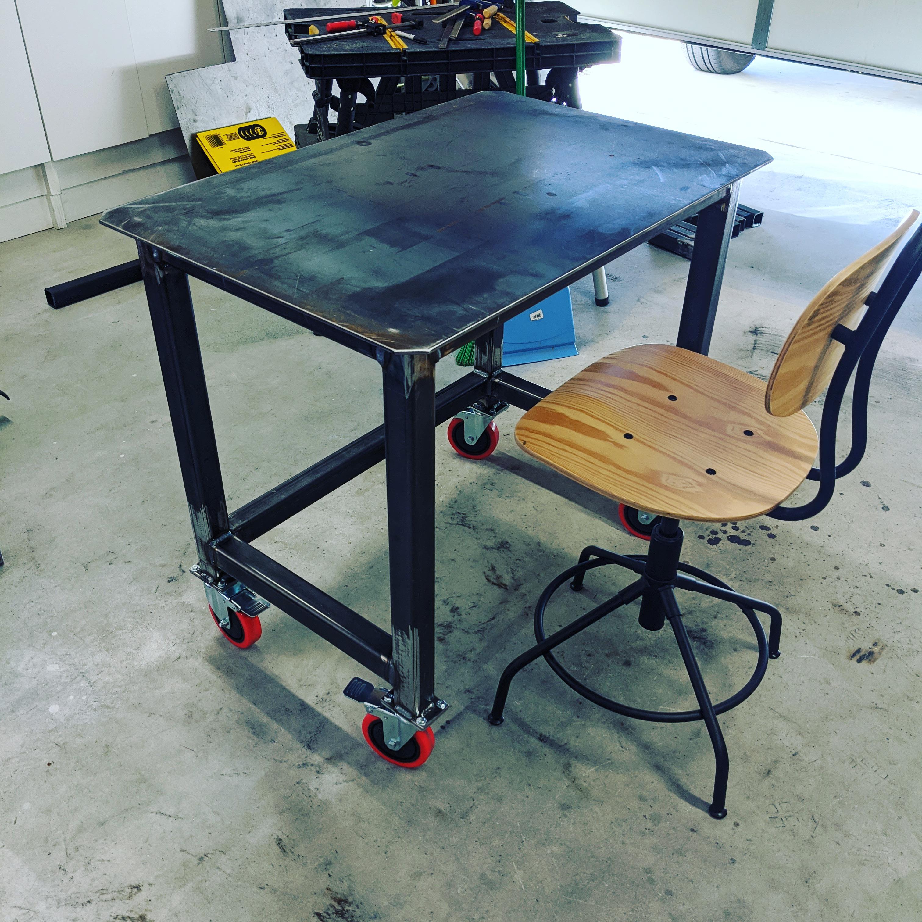 Finished the welding table. Now I can stop welding on my garage floor