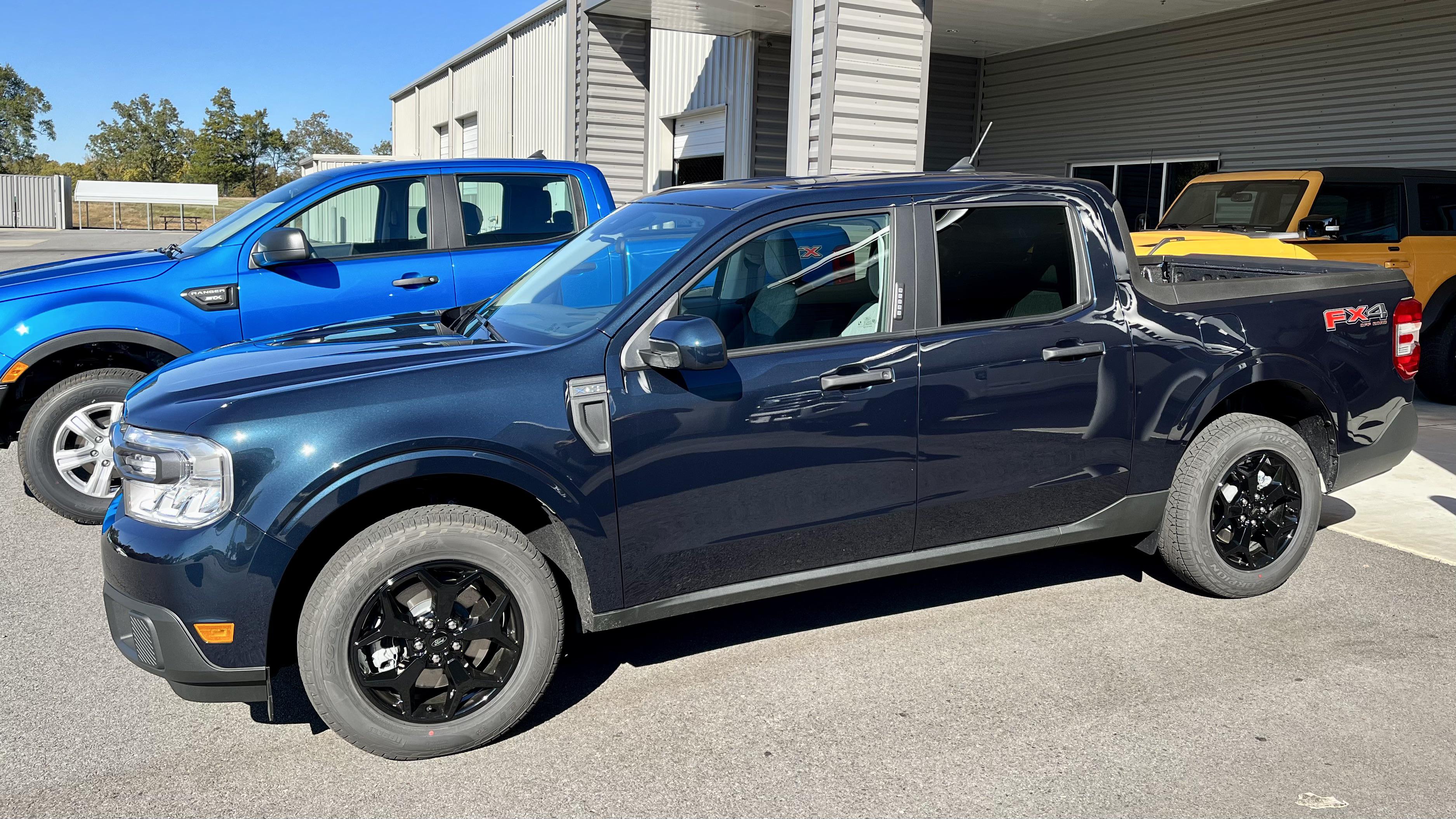 Alto Blue Maverick next to a Velocity Blue Ranger r/FordMaverickTruck