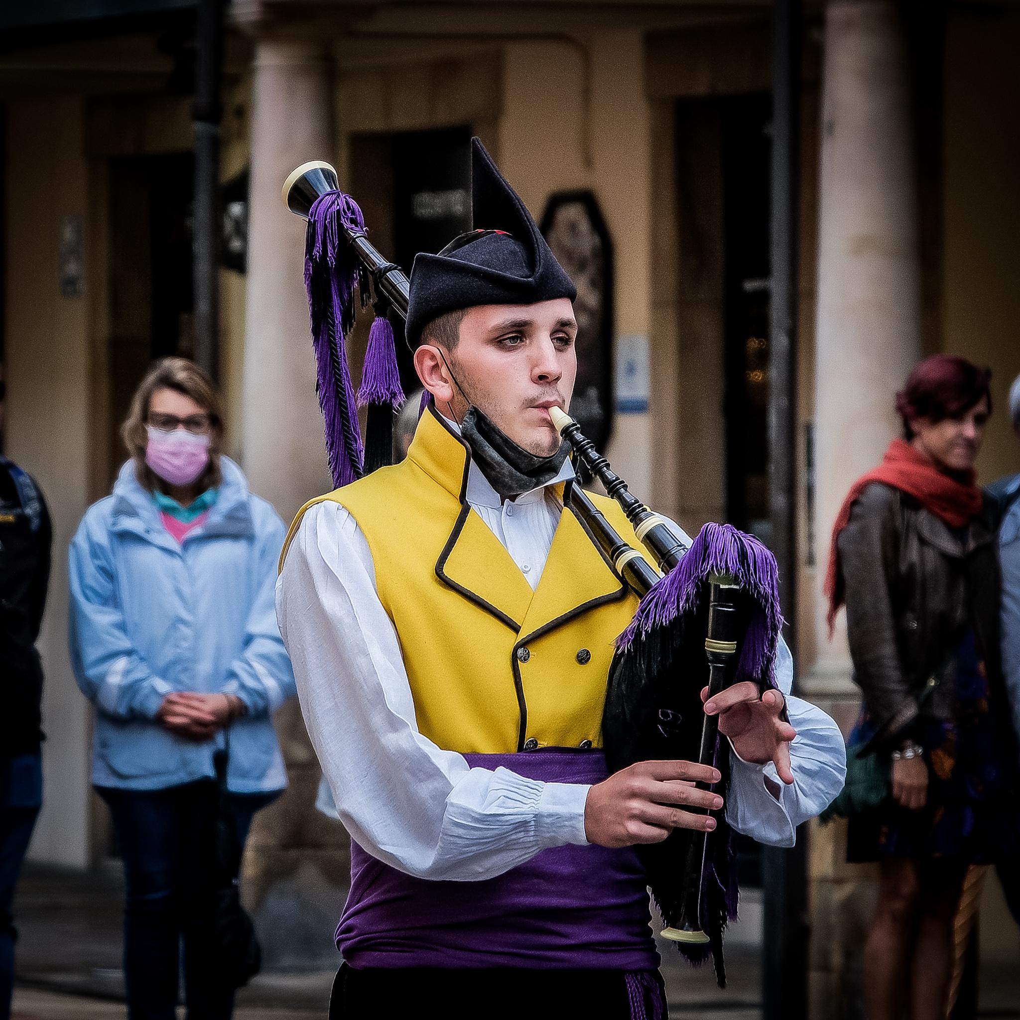 A gaitero/piper of gaita asturiana (Asturian bagpipe) during the Fiestas de San Mateo in Oviedo